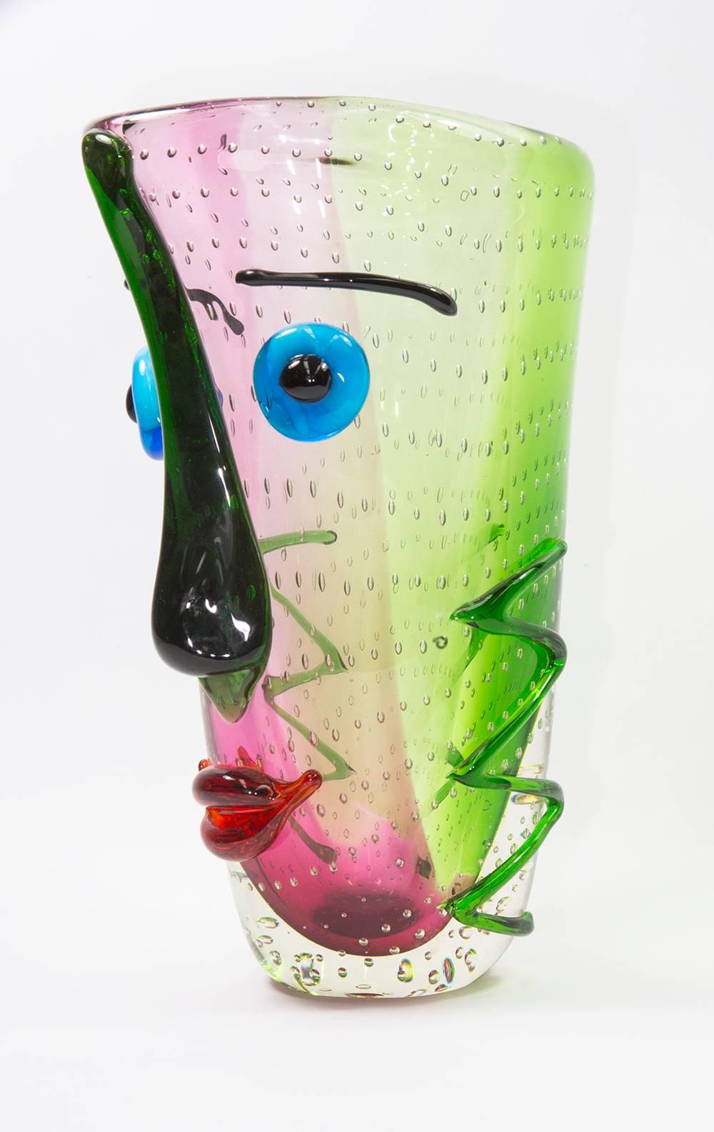For the lovers of Murano abstract glass this is a world class piece of art abstract glass at its best. A magnificent and very eye catching vase with very distinctive face design inspired by Picasso; made with multi Sommerso colors and bullicante