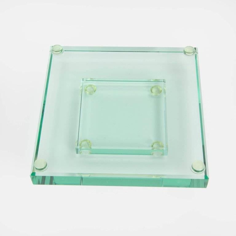 Fabulous Dynamic Large square Art Glass centerpiece; slumped glass bowl with wide cast frosted glass vermicular border, floating on separate square base. This spectacular piece is fashioned from 3/4 inch glass, with pencil-beveled edges; signed by