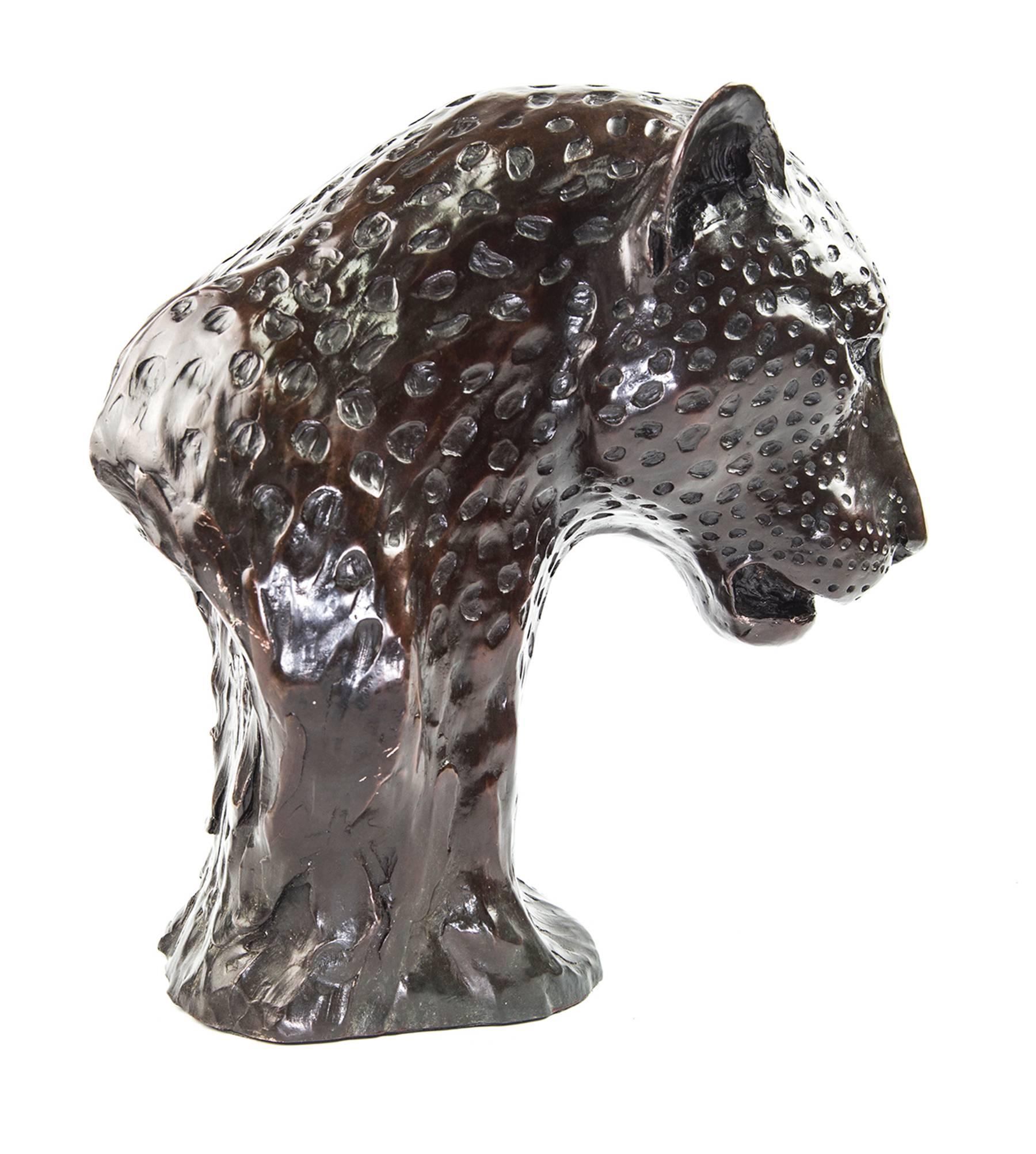 Fabulous bronze leopard head sculpture by Donald Greig, renowned South African sculptor, with a passion and deep appreciation for the bush and Africa's beautiful wildlife. Limited Edition 2 of 200 13.5” high x 7.5” wide x 13” deep.
      