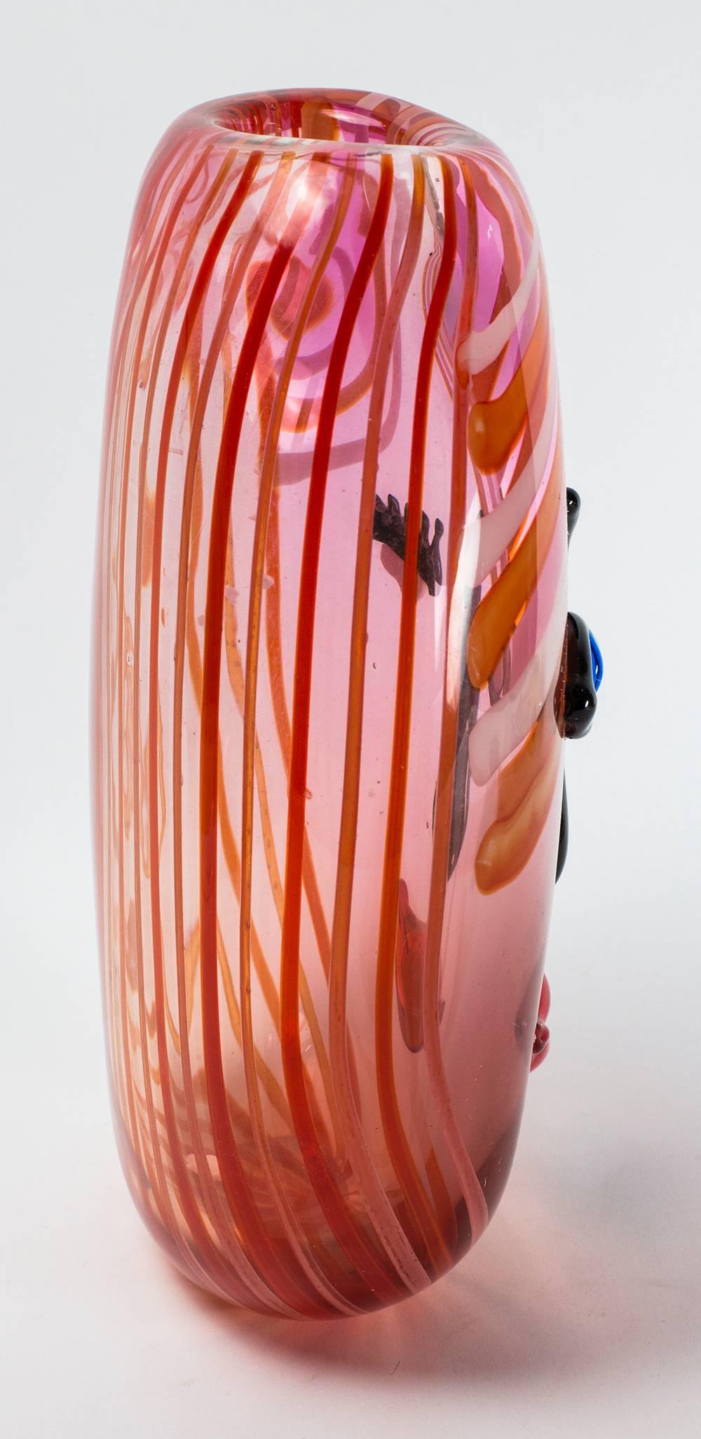 Fabulous Abstract Art glass vase depicting a girl’s face; eye-catching colors. 11.75” high x 8” diameter; approx. weight: 4190g (4.2kg). A World Class art glass suitable for any collection!
 