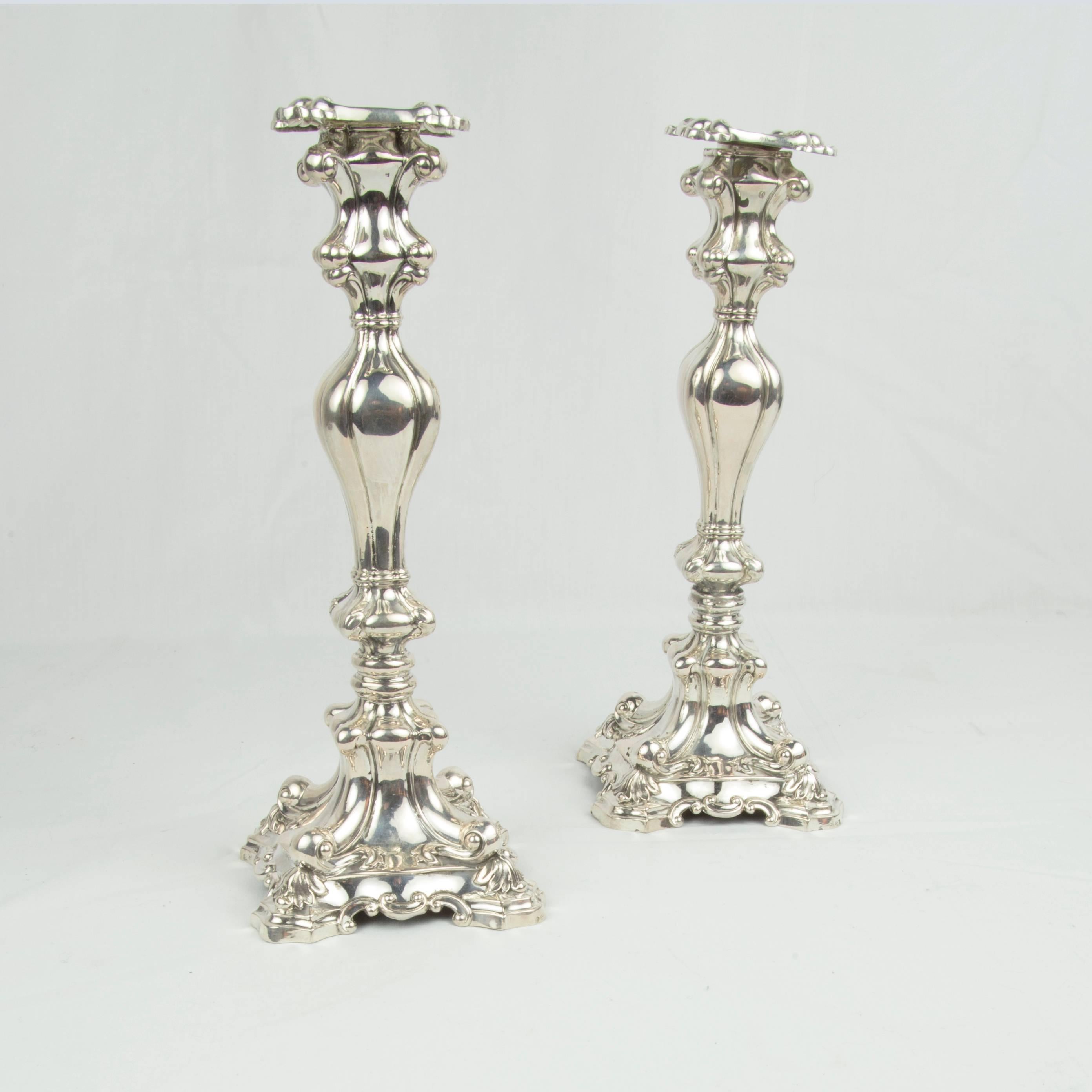 Pair of elegant French Louis XV style silver candlesticks; hallmarked for Orly.
