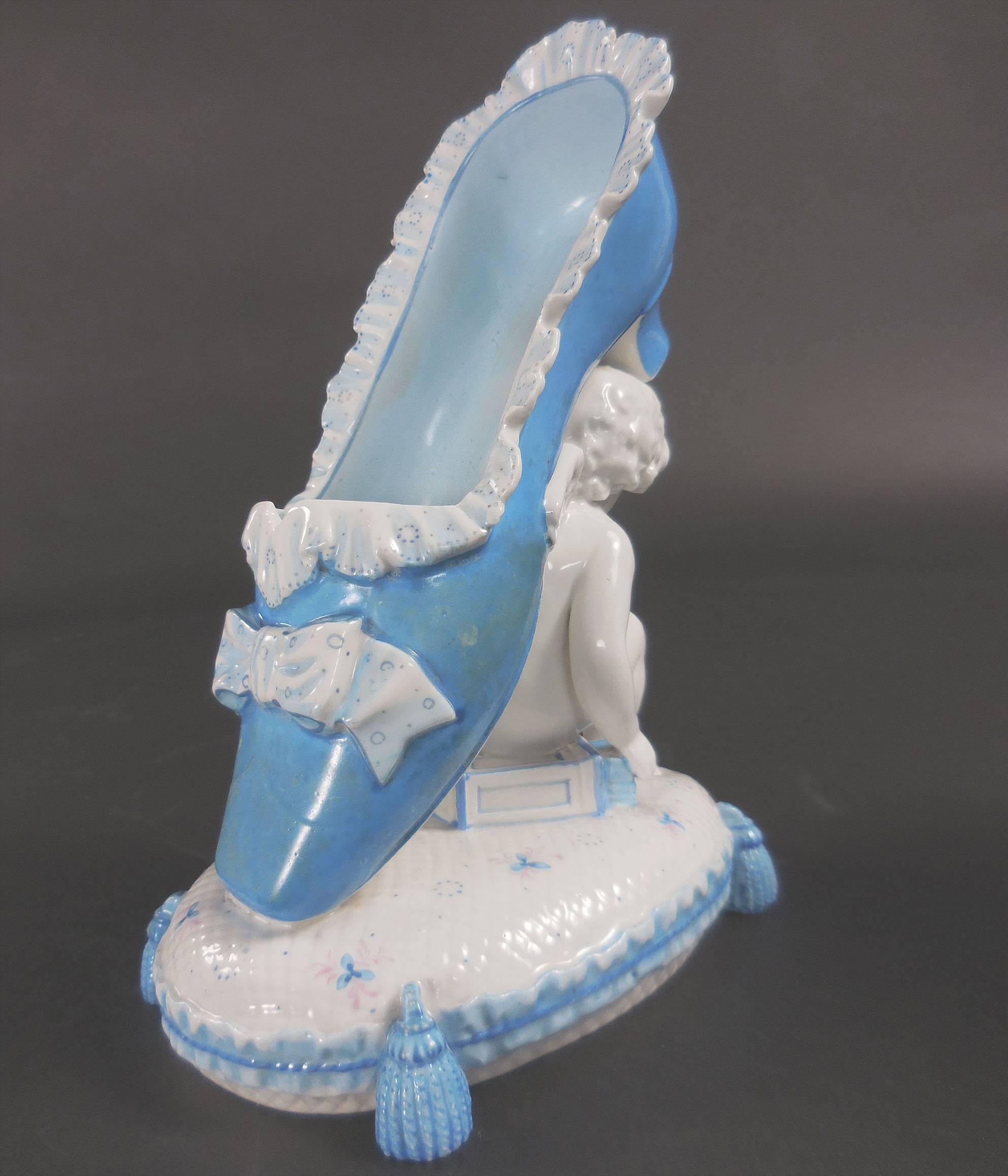 Baroque Antique Meissen Porcelain Figurine of Cherub Kneeling on Cushion with Slipper