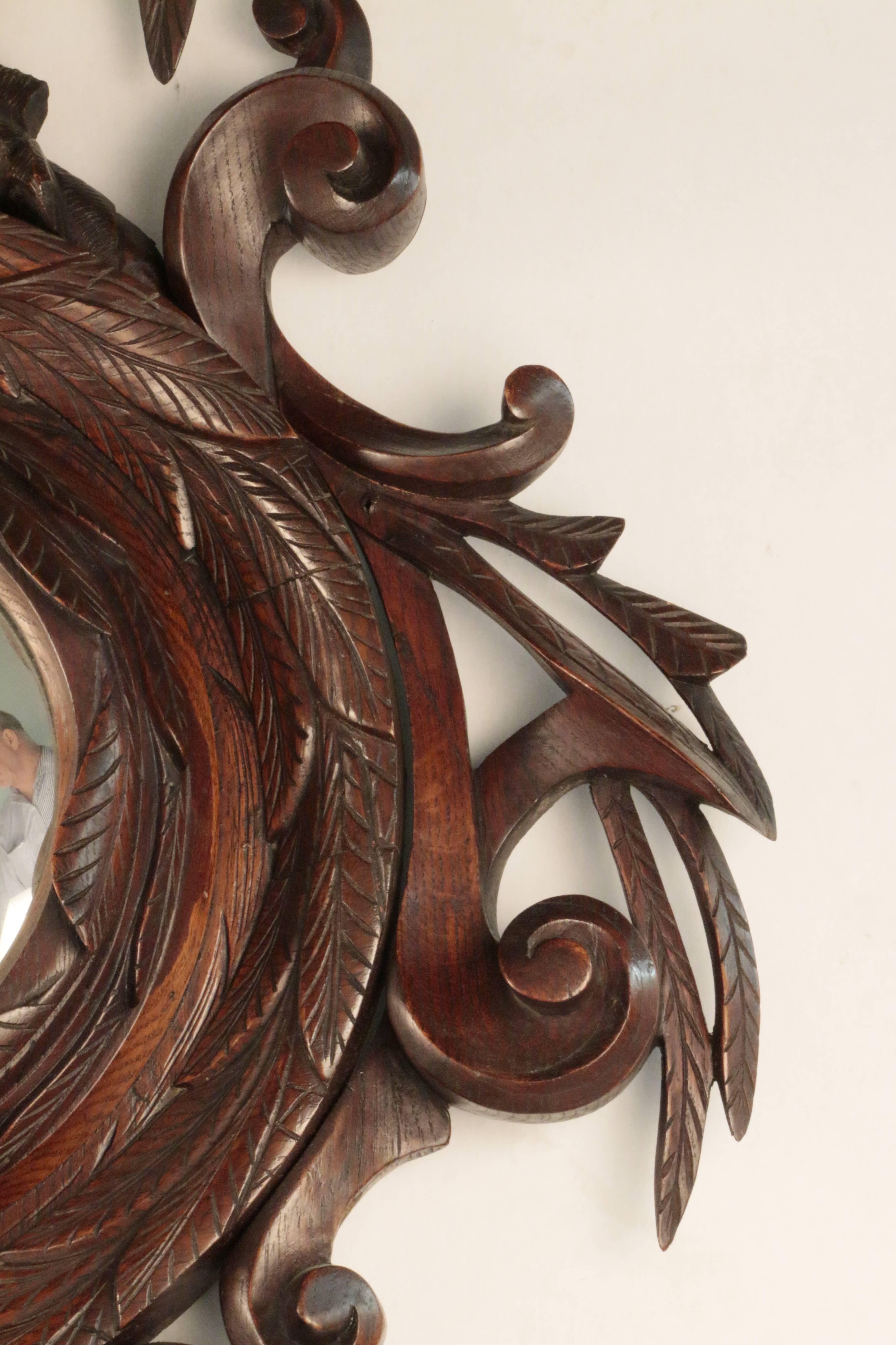 Folk Art Continental  Carved Oak Convex Mirror with Bracket Shelf For Sale