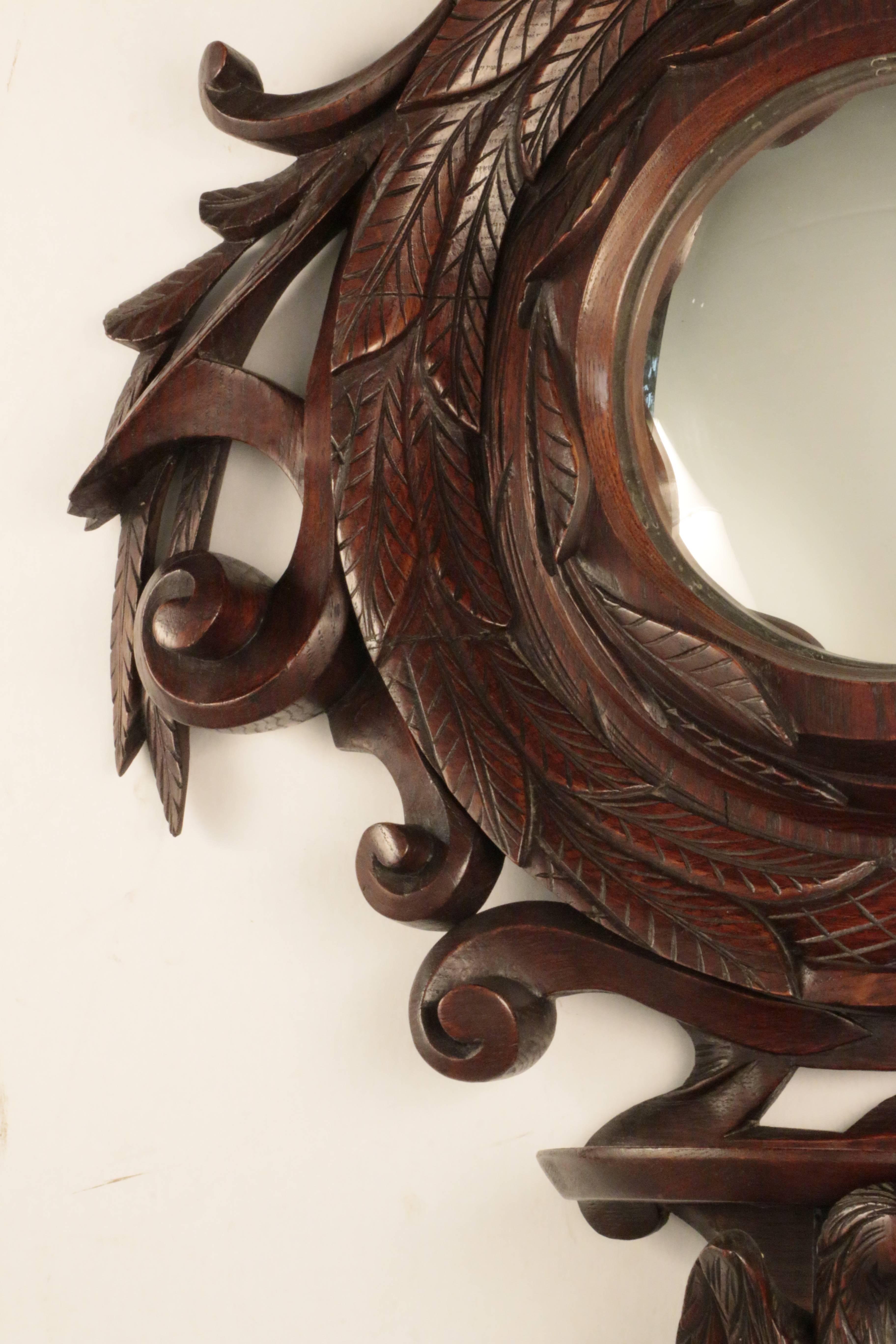 Hand-Carved Continental  Carved Oak Convex Mirror with Bracket Shelf For Sale