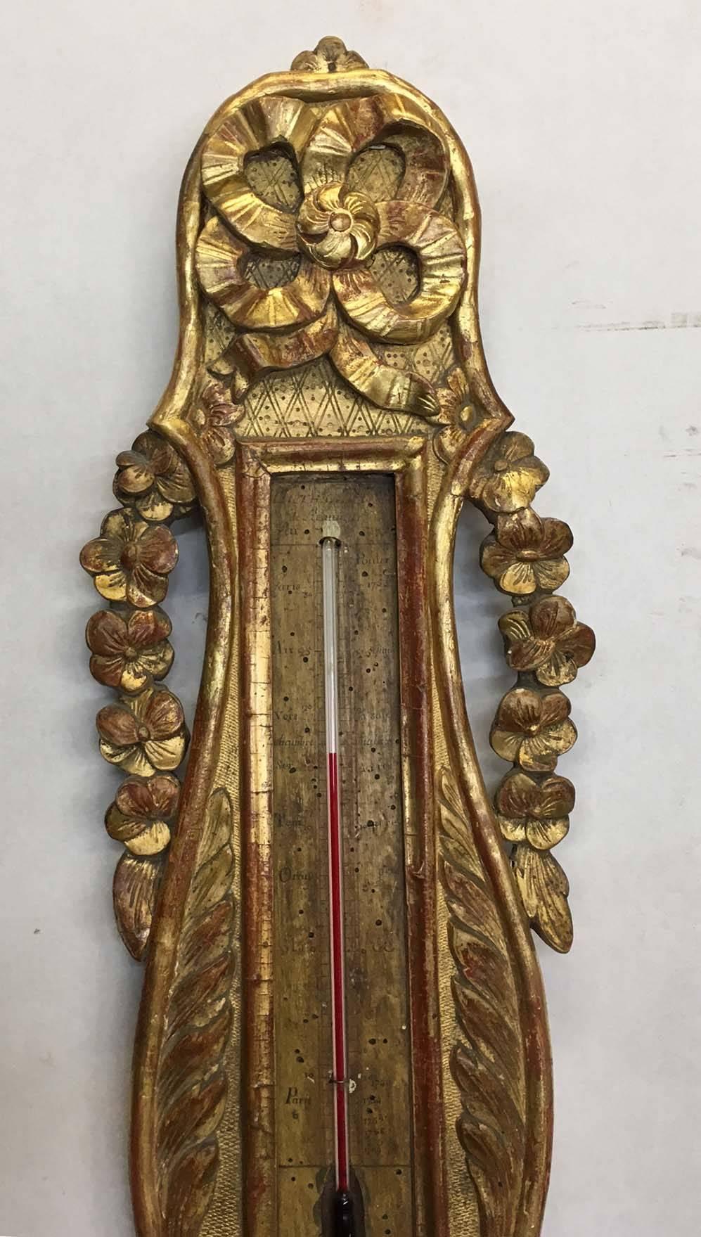 XIXe siècle thermomètre / baromètre bois doré de style Louis XVI en vente