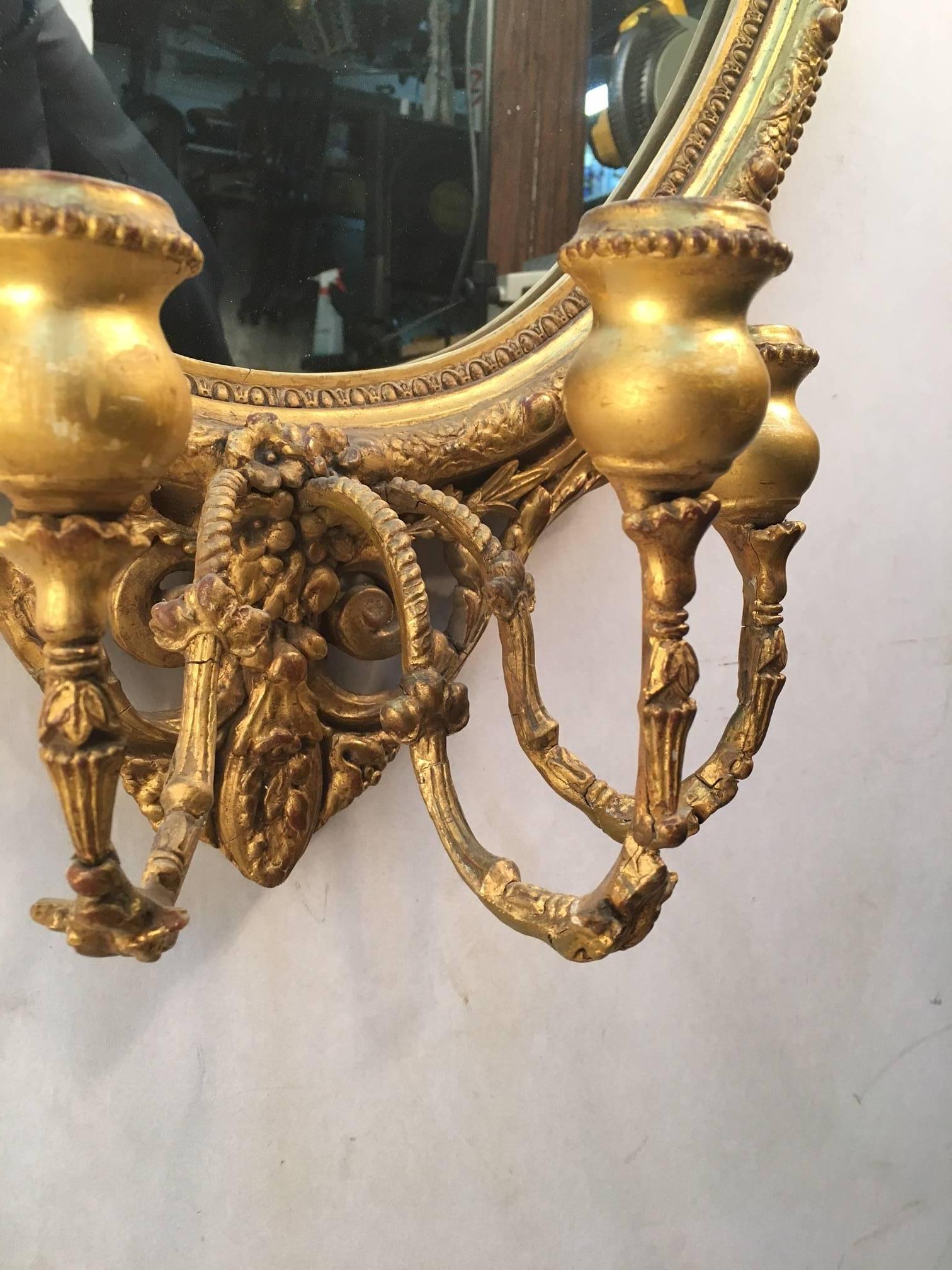 French Pair of Louis XV Style Carved and Giltwood Girandole Mirrors For Sale