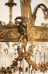 Pair of Louis XVI Style Gilt Bronze and Crystal Chandeliers