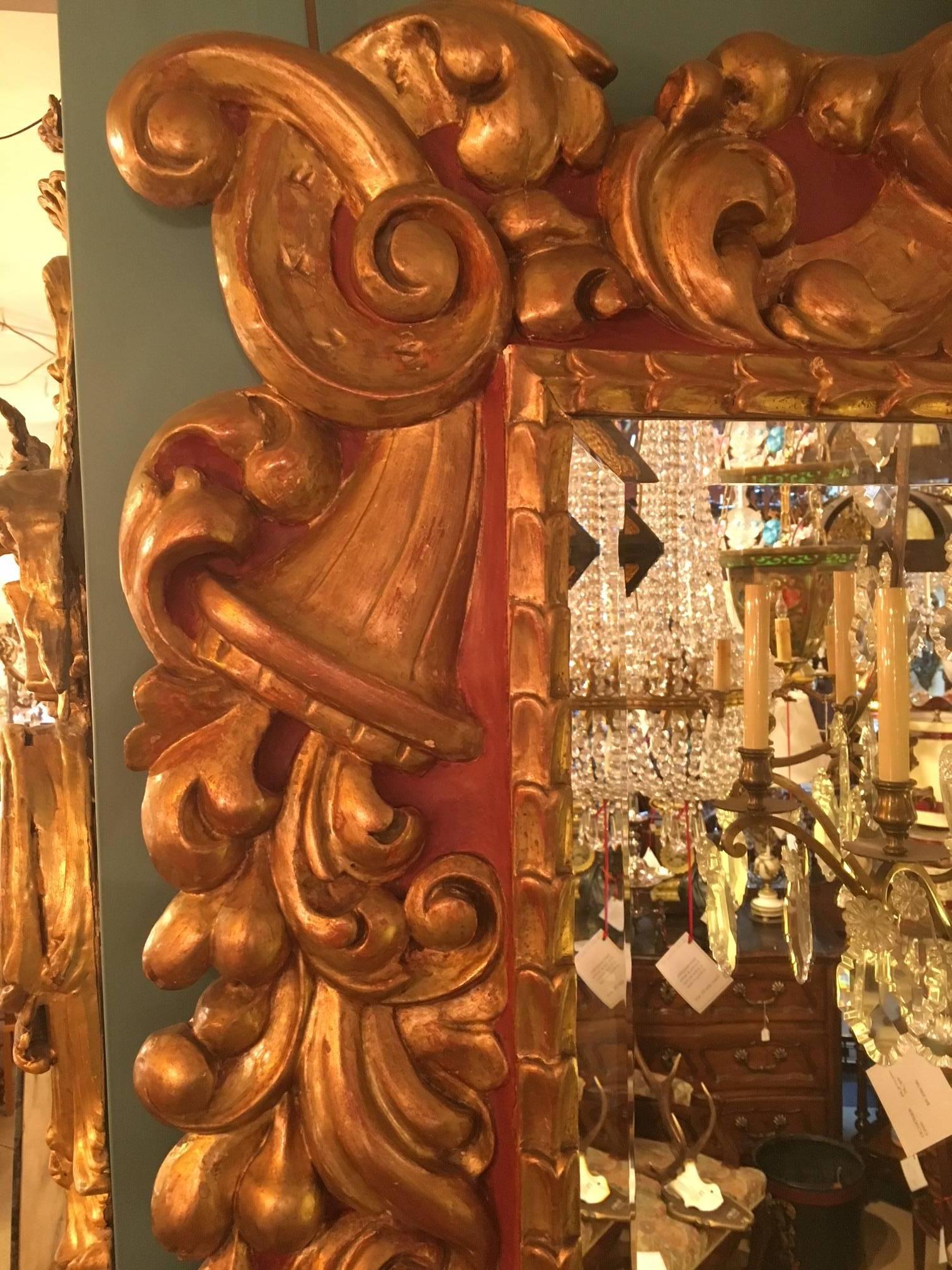 Wood Baroque Style Mirror,  the Frame Carved Painted and Gilt  For Sale
