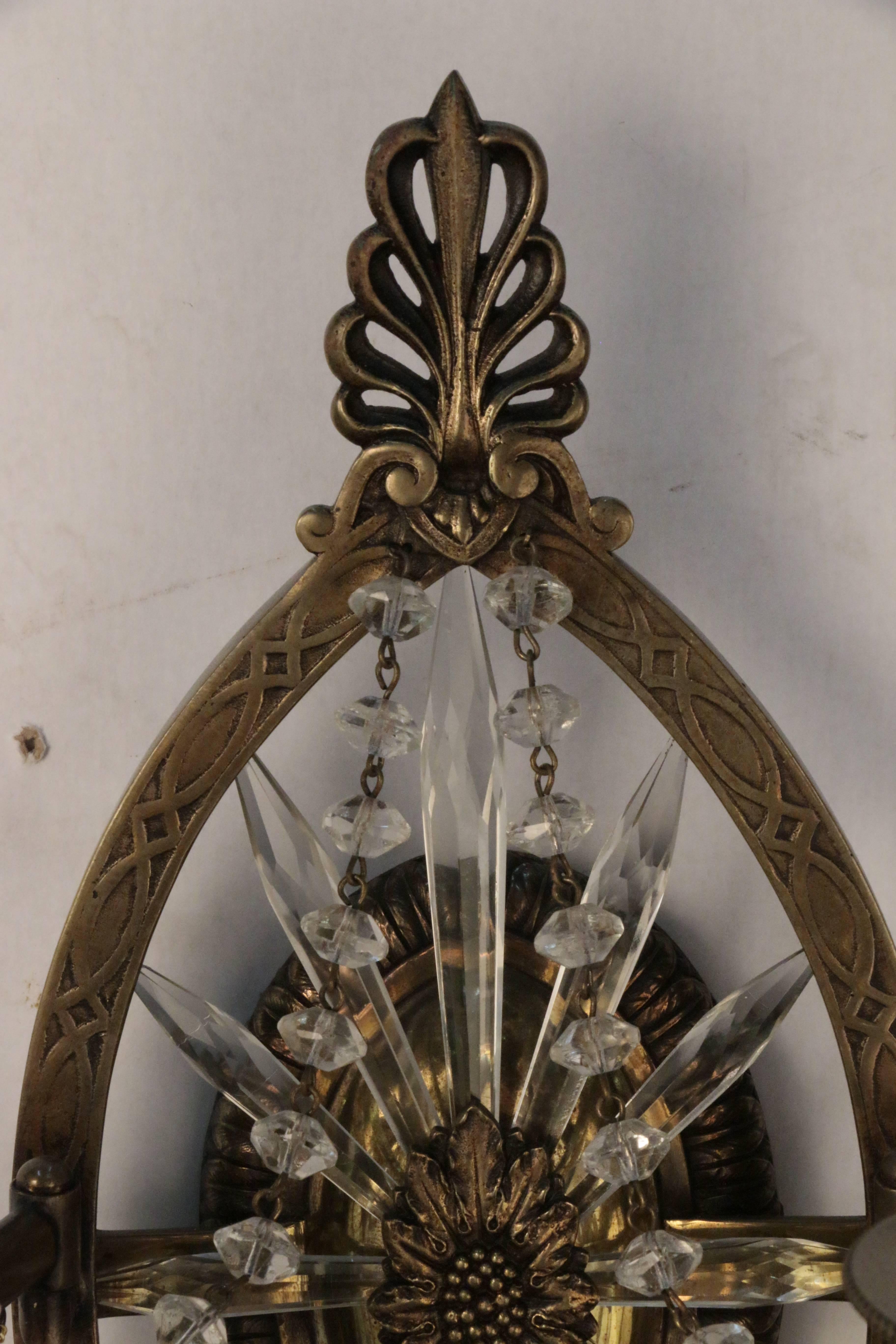 Carved Pair of American E. F. Caldwell Bronze and Lead Crystal Wall Sconces For Sale