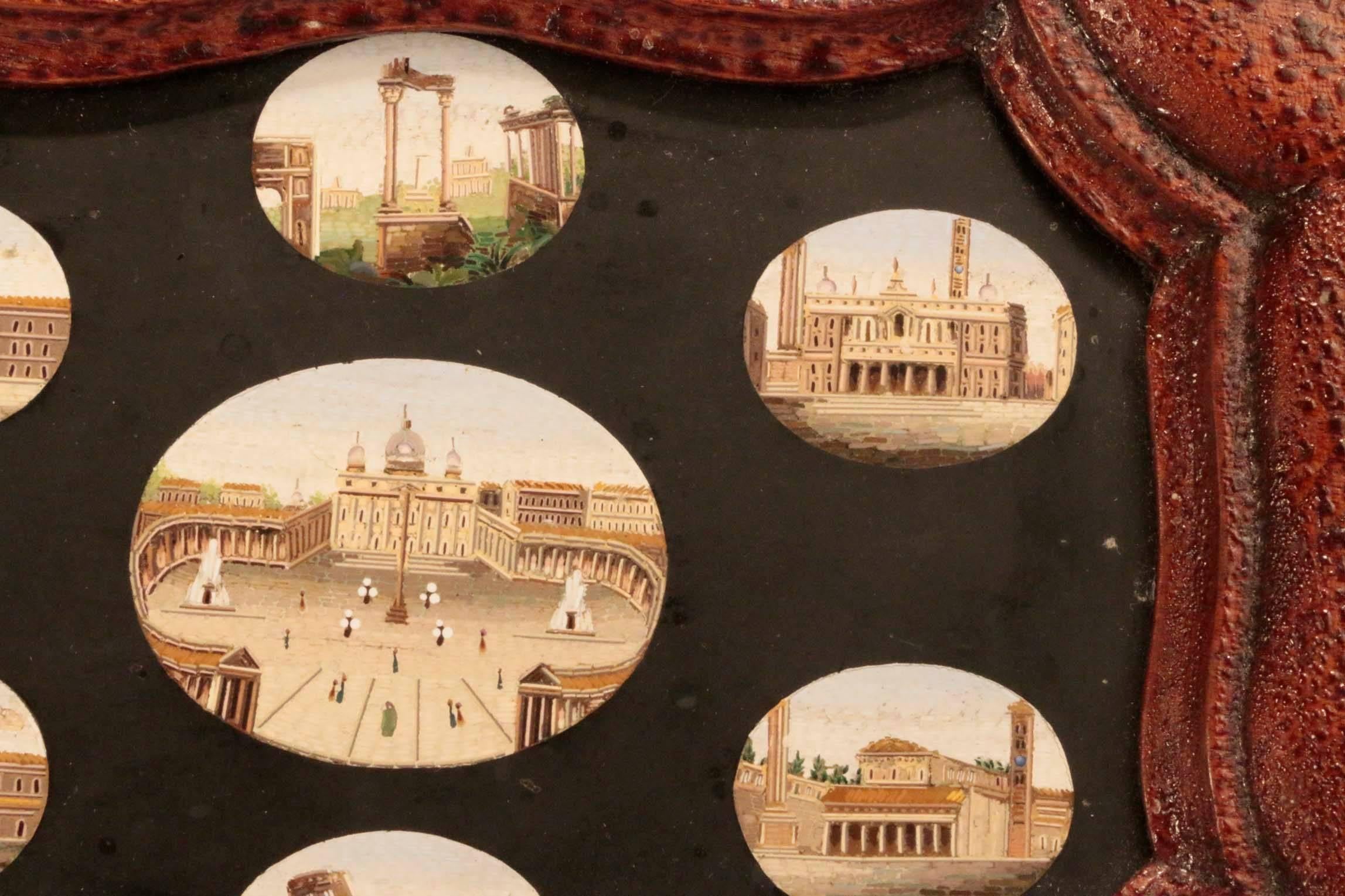 Superb quality antique micro-mosaic Grand Tour Souvenir of a visit to Rome. set with seven panels, vignettes of Roman views in a shaped slate tablet. and in original frame. Part of a Gentleman's education was a visit to Rome, it still is.

Such