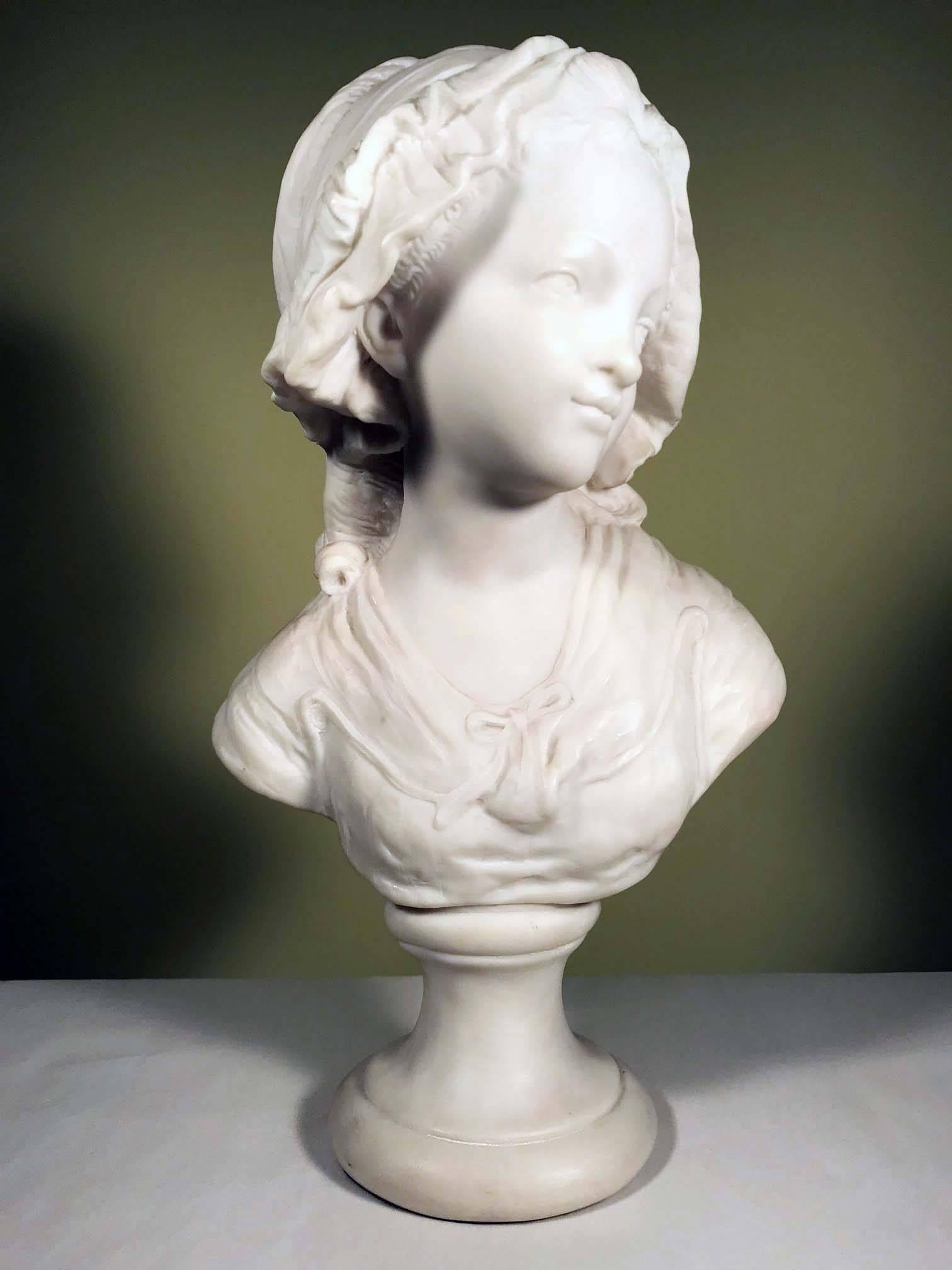 A pair of French white cast  marble busts of children. The boy in tricorn hat and with frilled shirt, the girl with a bonnet,  These charming busts are very much in the spirit of the late eighteenth century in France before the revolution. They