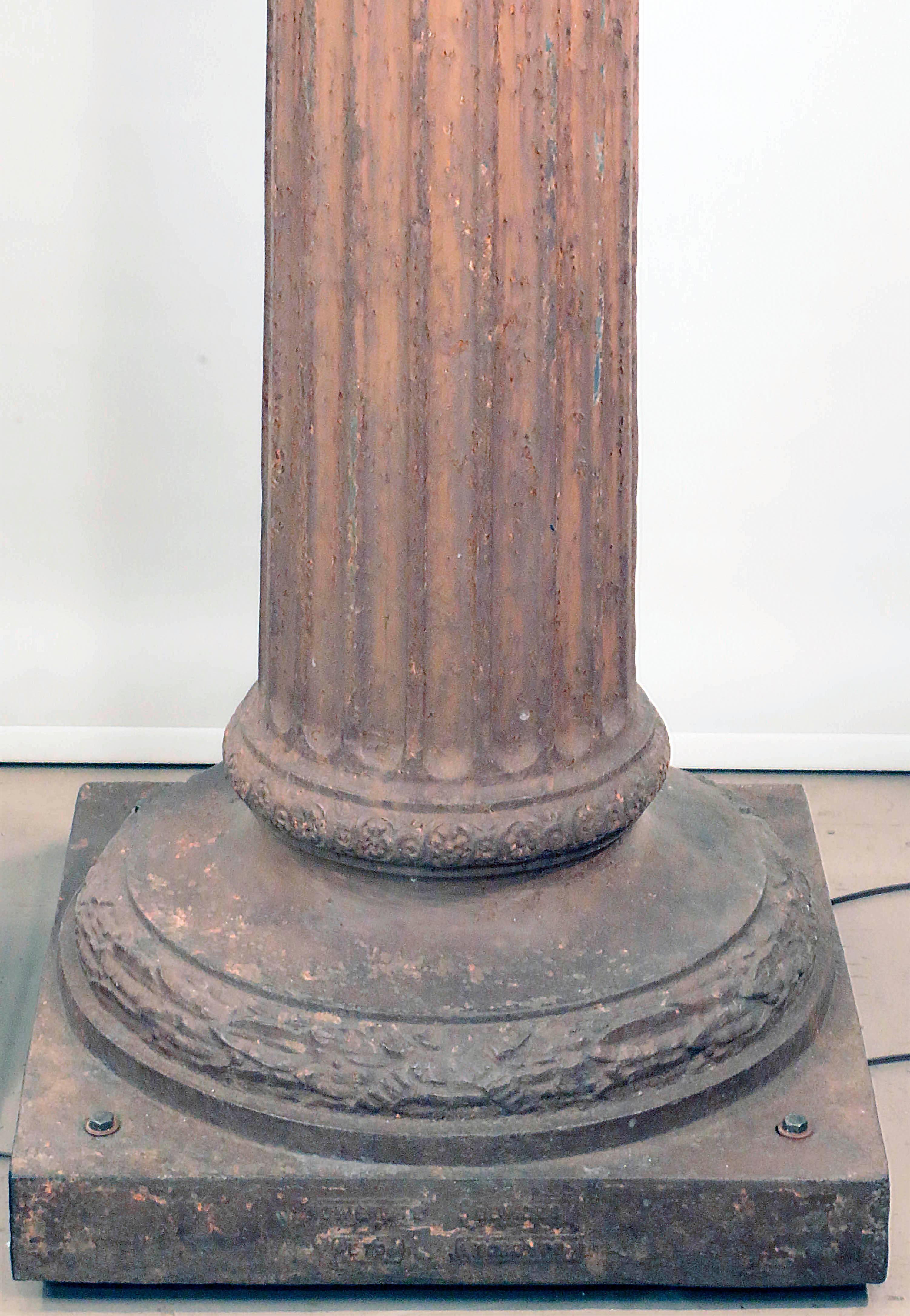 Pair of Antique Cast Iron Columns, Mounted as Exterior Street Lamps In Good Condition For Sale In Montreal, QC