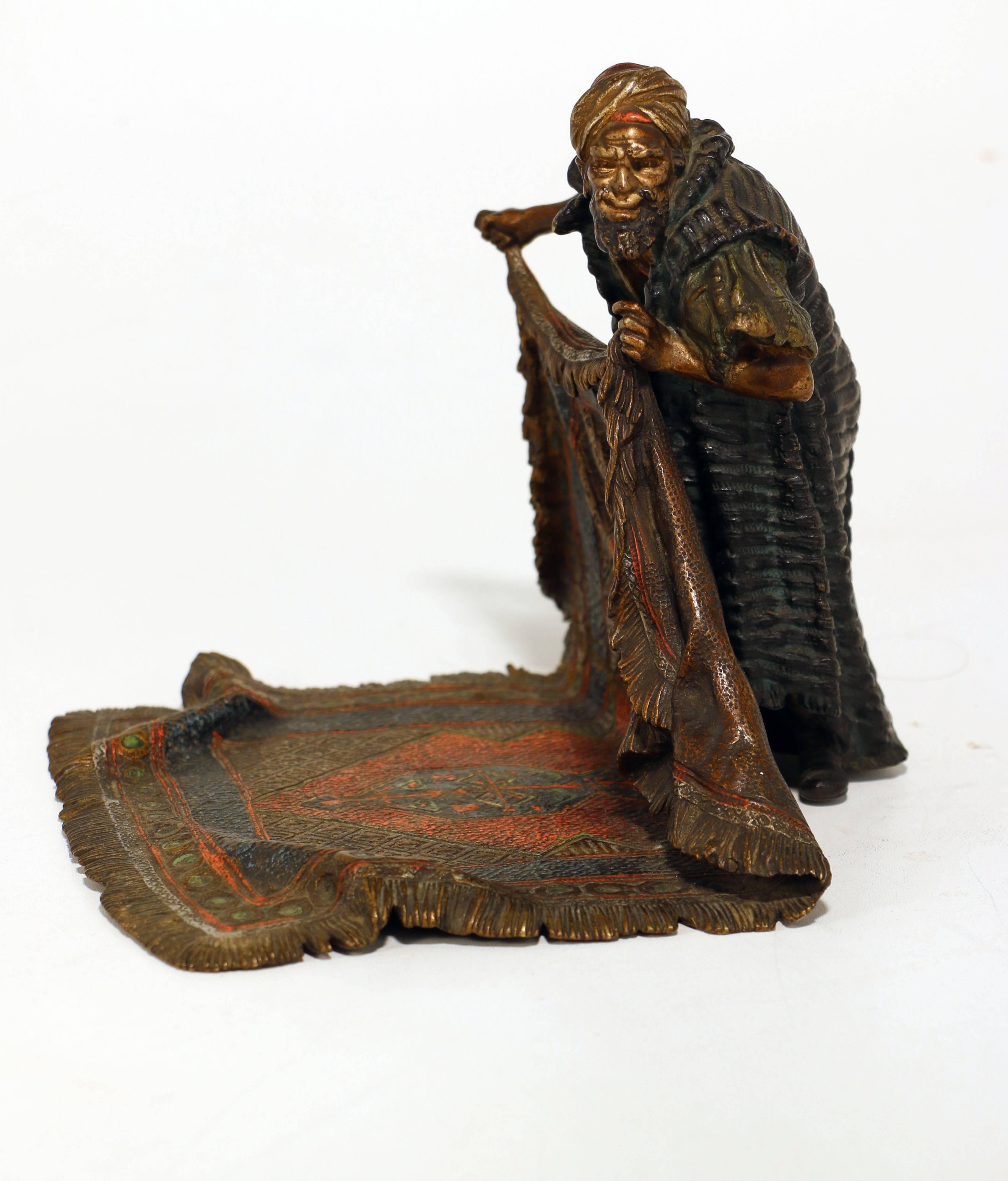 Austrian Good Bergman Bronze of a Arab Carpet Dealer Showing His Wares