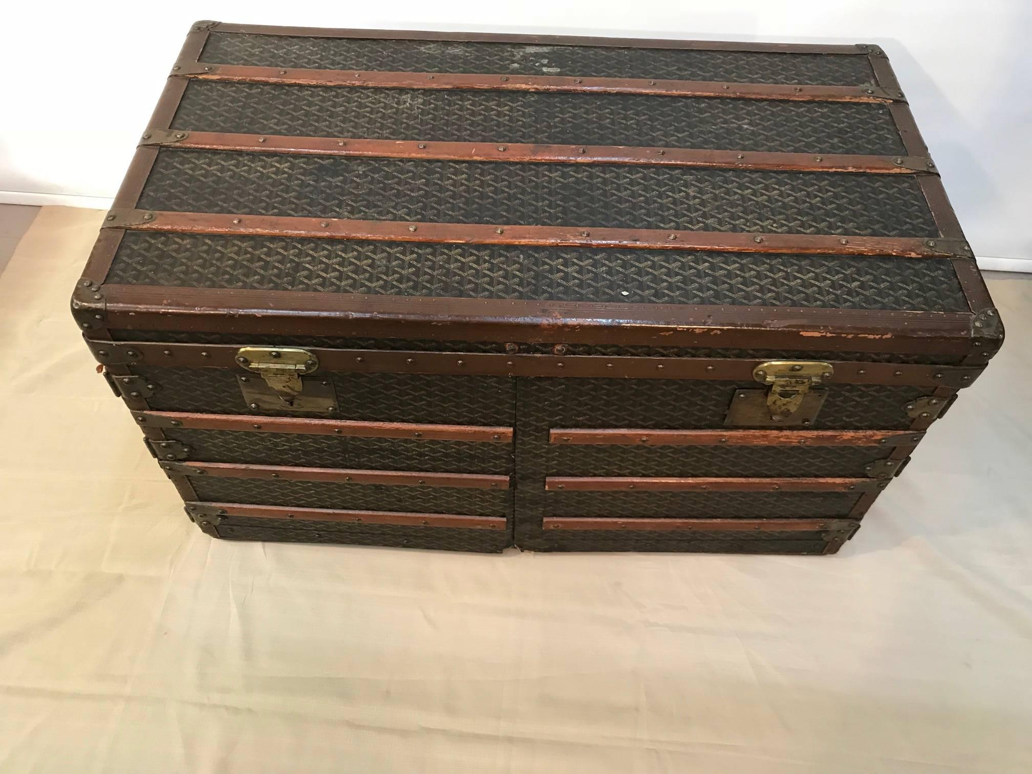 This superb example of the French luggage maker's art combines quality, beauty and functionality in equal measure. Unusually for such a trunk, it opens from the front with two doors as well from the top, (This is why the ribs are short on the