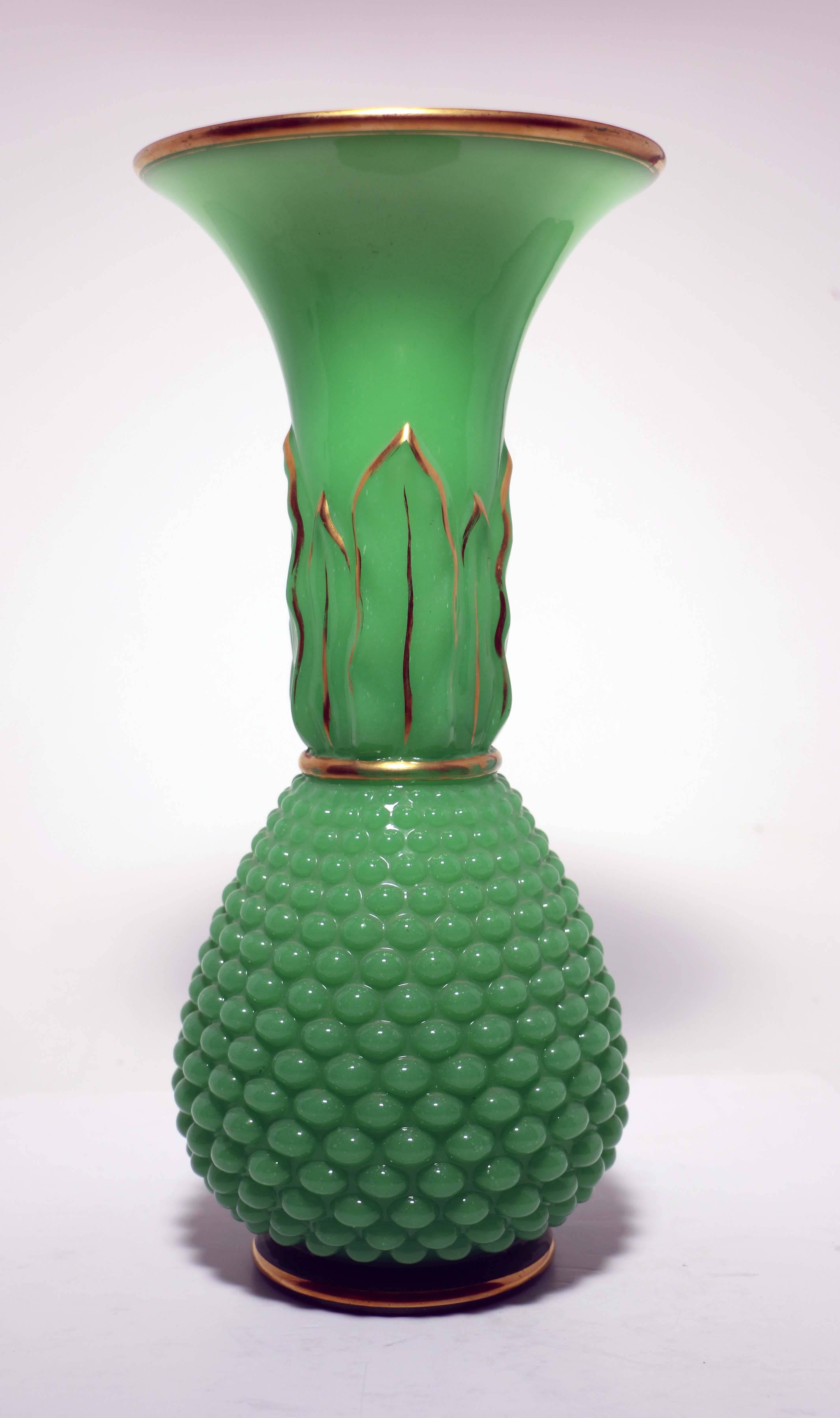 It is hard to praise these vases enough. This color was invented in the 1840s in France. Occasionally clumsy attempts to imitate them are found but these are plainly the right stuff. From knobbly ovoid base to flaring trumpet-shaped mouth they