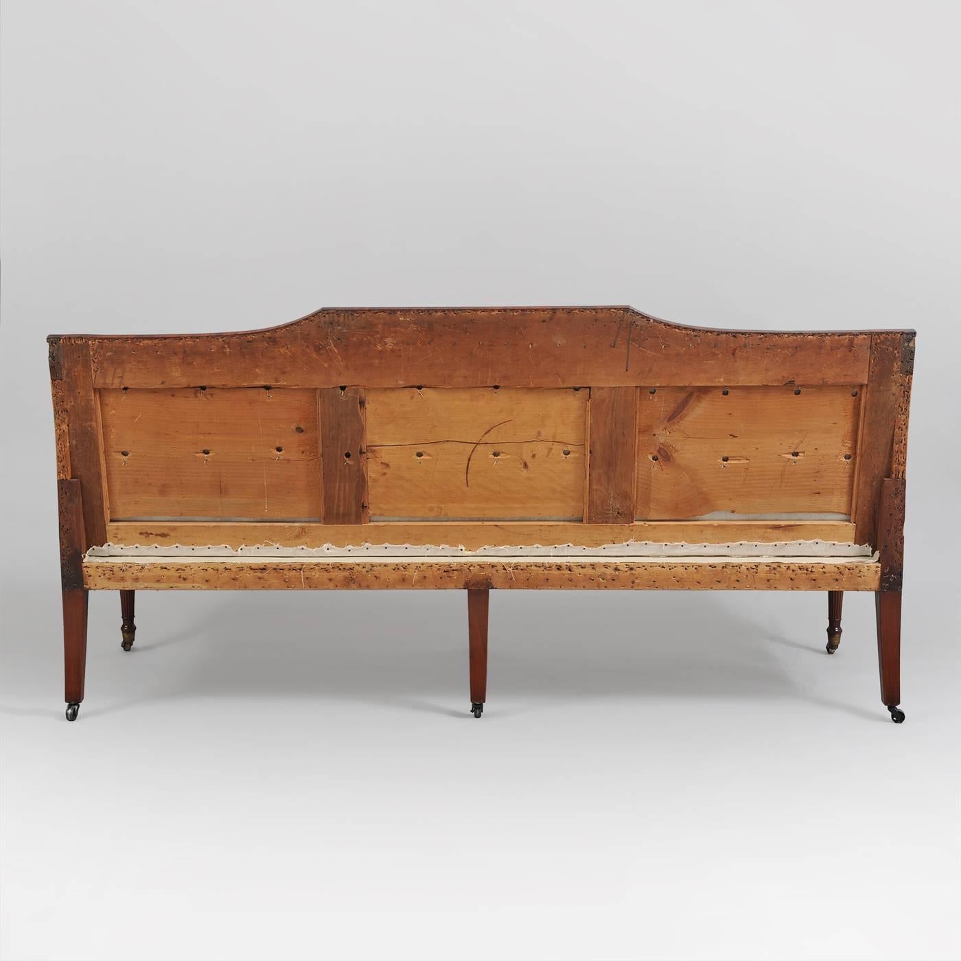 Probably Salem, Massachusetts, circa 1810.
Mahogany, mahogany veneer, bird's-eye maple inlay, white pine secondary wood.
Condition: Excellent. Minor repairs (re-enforcement to the crest rail joining the back stiles. Additional holes to the back