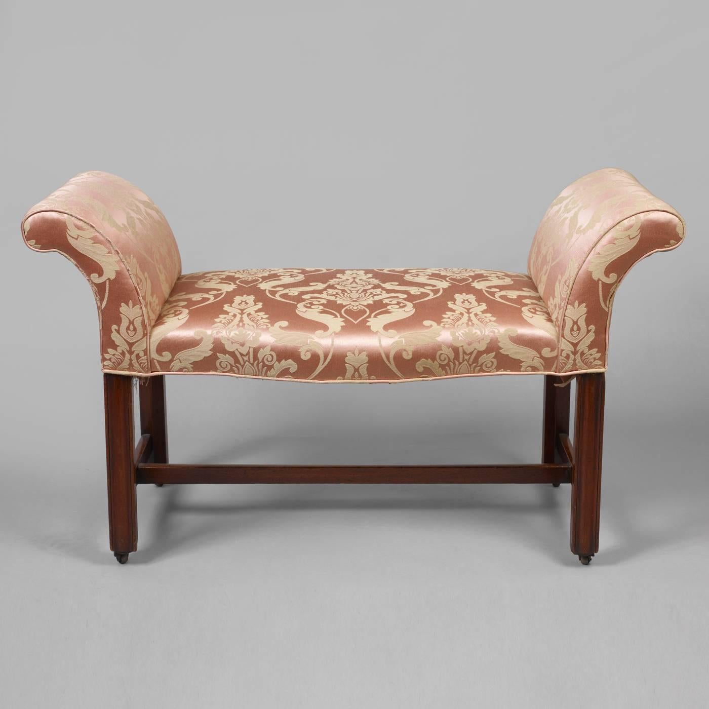English, circa 1770-1790.
Mahogany, hardwood frame and supports.
The elegantly proportioned form having scrolled arms with a serpentine front is supported by finely carved molded legs with a stretcher base ending on casters.
Condition: Excellent