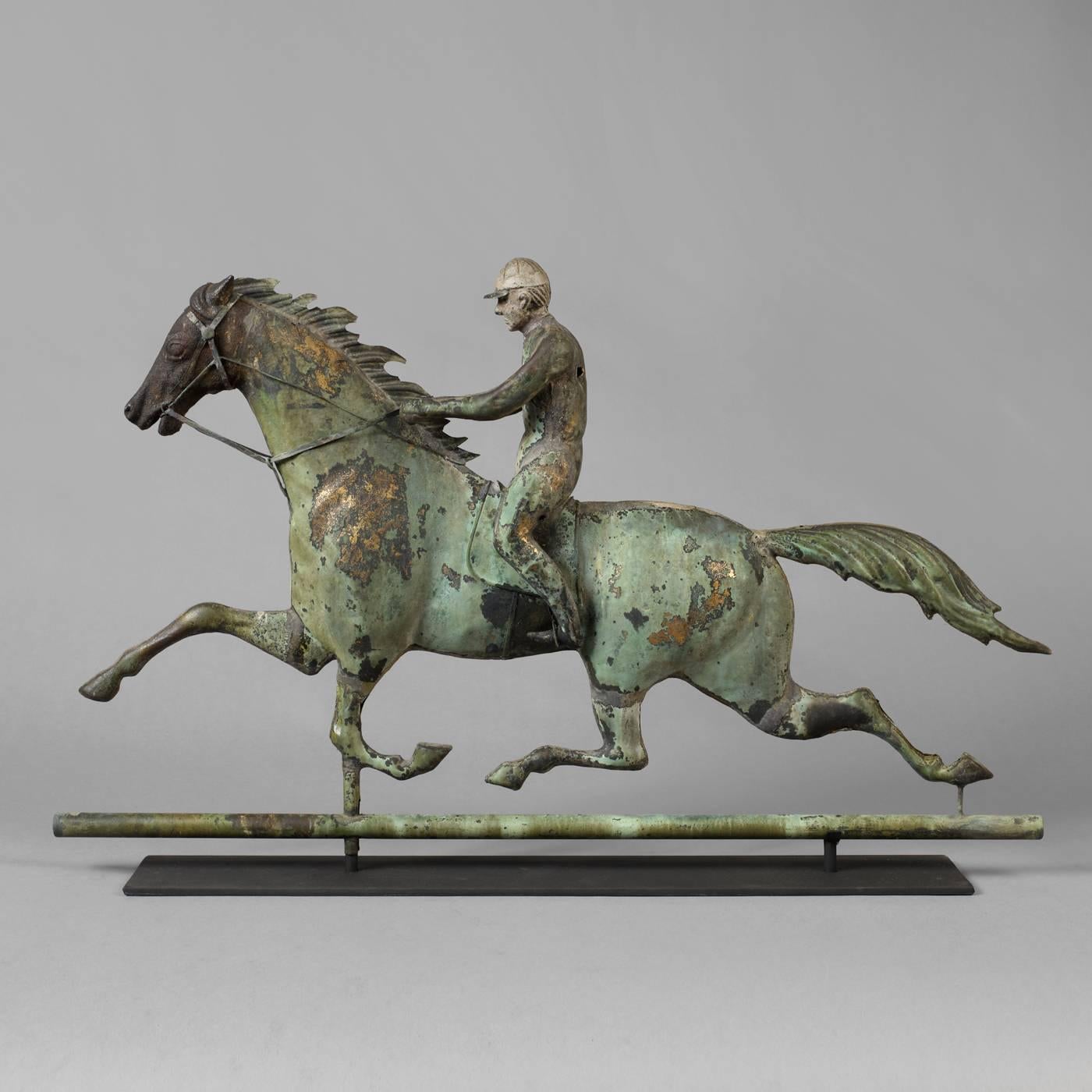 Attributed to Cushing and white, Waltham, Massachusetts, circa 1880-1890. Copper, copper tubing, cast iron, zinc Condition: Fine condition, minor imperfections, retains traces of original gilt with Verdigris surface. The form of a horse with jockey