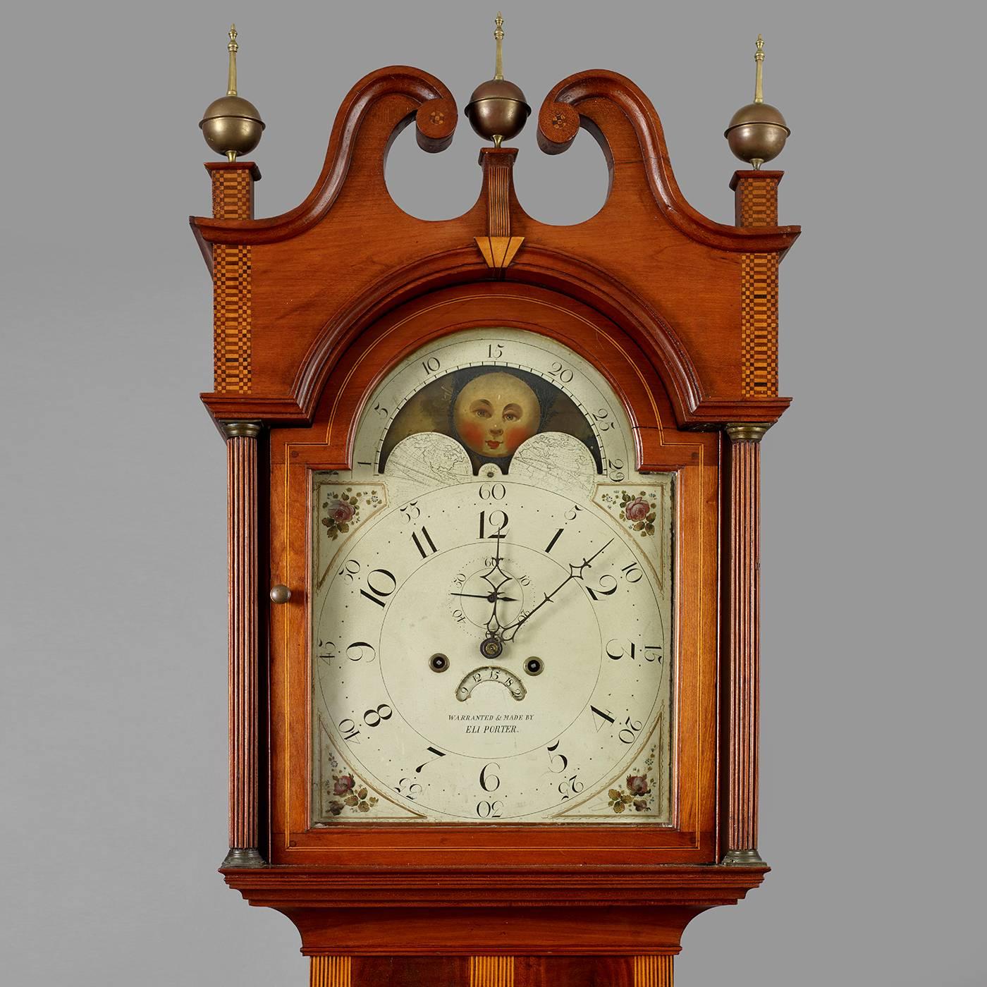 Williamstown, MA., circa 1810. Cherry, mahogany, various woods for inlay Condition: Excellent condition, (see condition report). Highly inlaid formal cherry tall case clock made and signed by Eli Porter on bothe the dial and the movement. The form