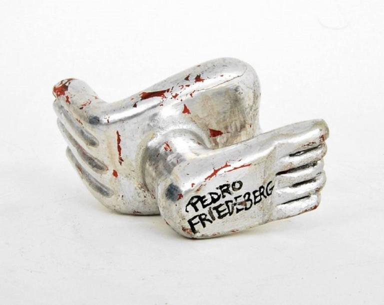 A Wonderful and Miniature Hand Sculpture by Pedro Friedeberg (b. 1936)

Of Silver Leaf over Carved Wood.

Signed On The Bottom.