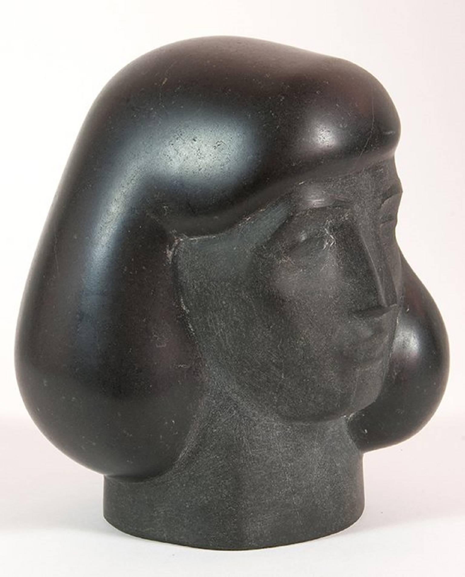 Dark granite sculpture of a woman's head by Walter Dreisbach (1929-2015) 

Signed on underside 