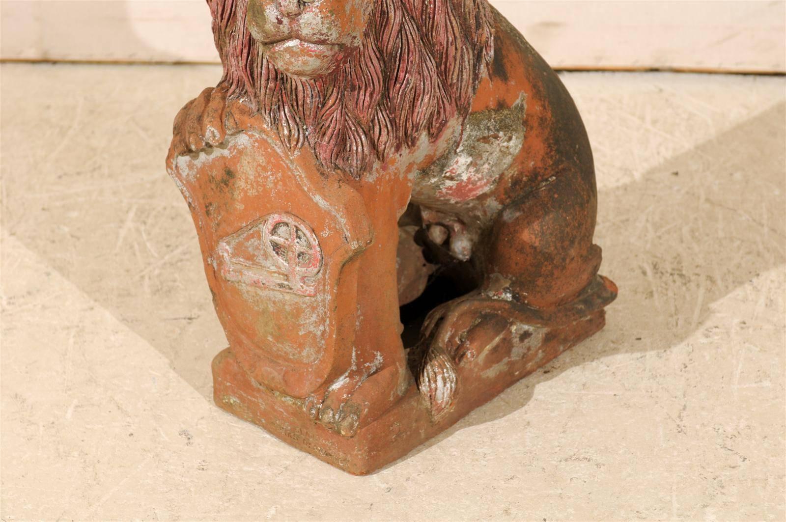 British Colonial Terracotta Lion with Shield of Medium Size with Beautiful Aging In Good Condition In Atlanta, GA
