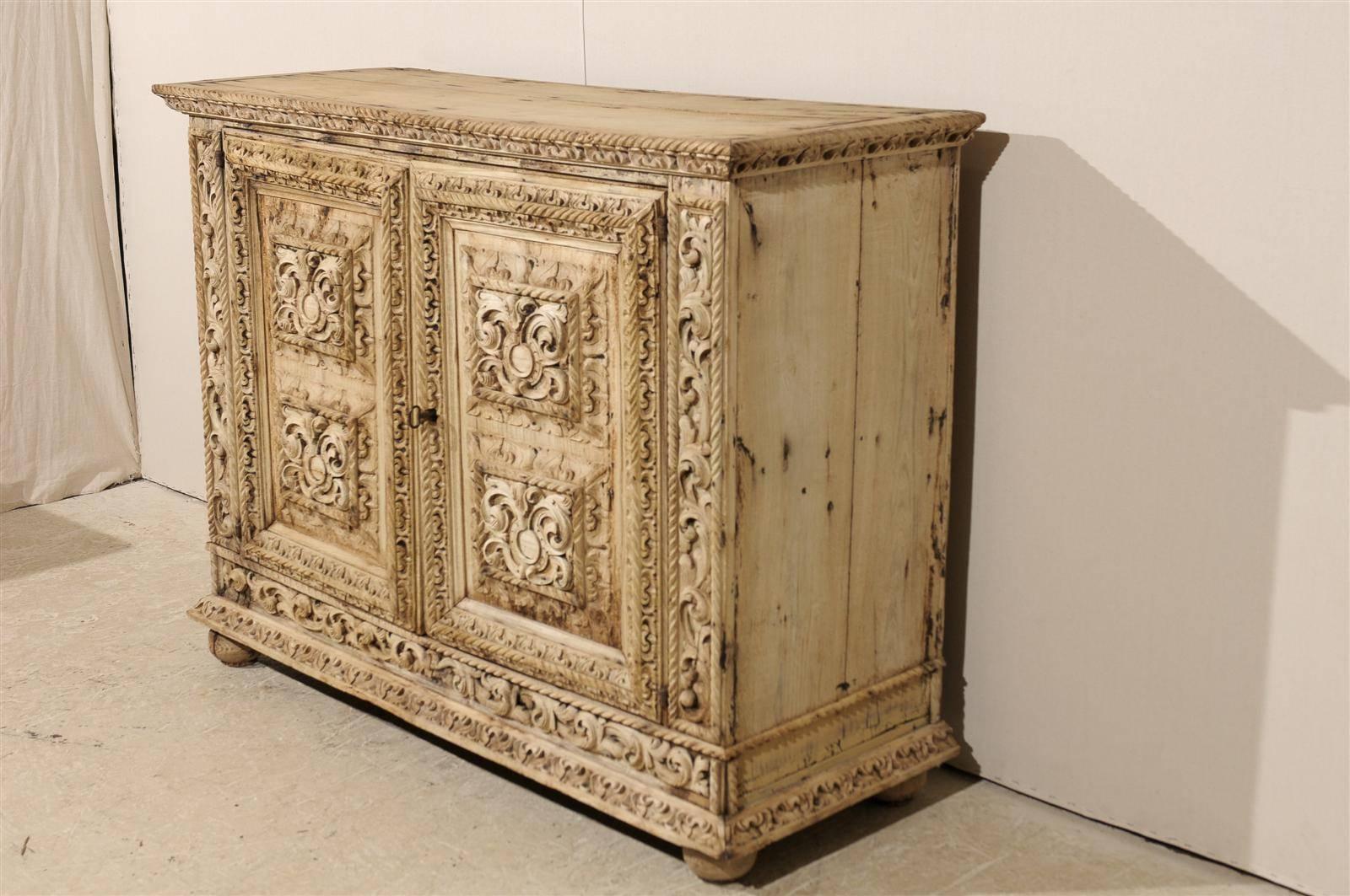 An Italian 18th Century Two-Door Bleached Wood Credenza Richly Carved with Age 3