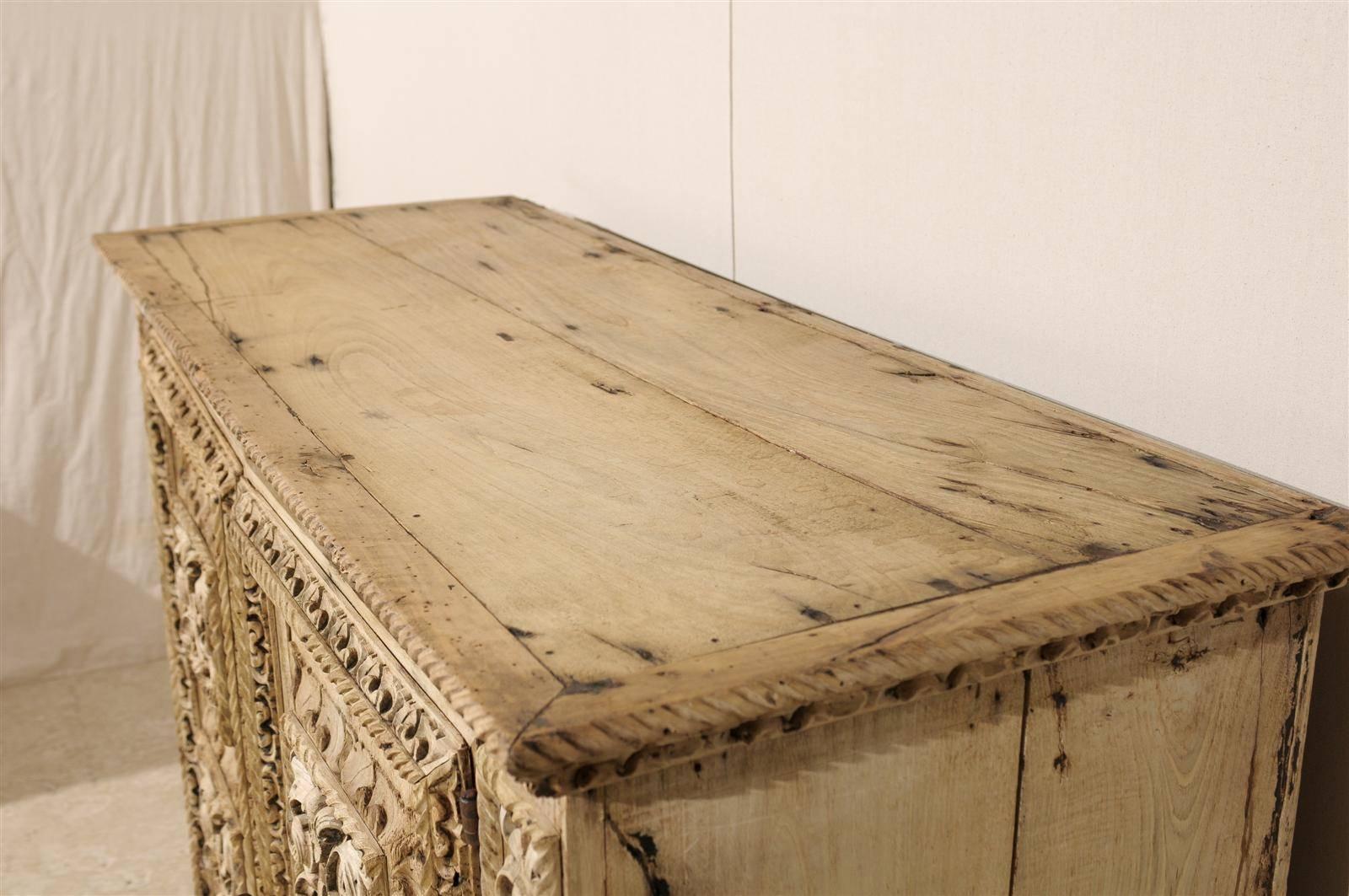 An Italian 18th Century Two-Door Bleached Wood Credenza Richly Carved with Age 4