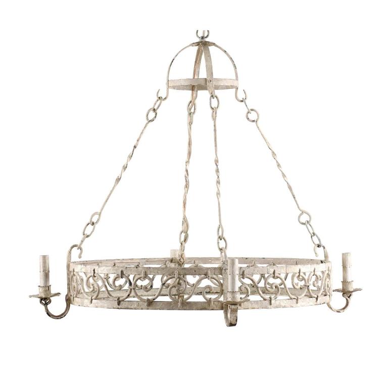 French Vintage Oval Shaped 4 Light Painted Iron Chandelier In French Vintage Oval Shaped 4 Light Painted Iron Chandelier In Cream Color For
