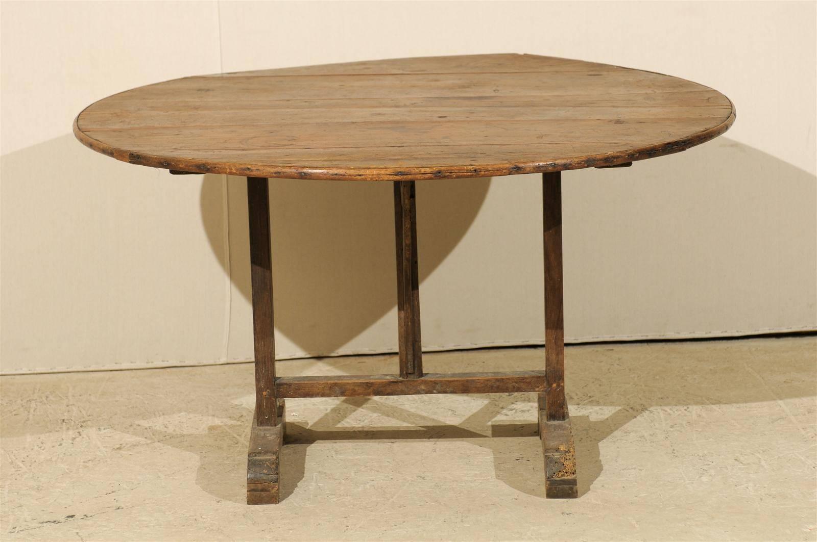 A French Wine Tasting Table with Medium Size, Round Shape  and Nice Patina In Good Condition In Atlanta, GA