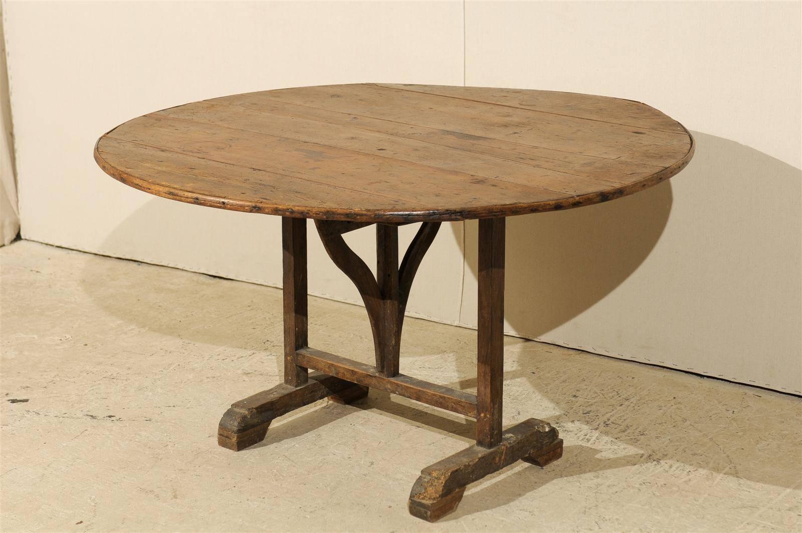 20th Century A French Wine Tasting Table with Medium Size, Round Shape  and Nice Patina