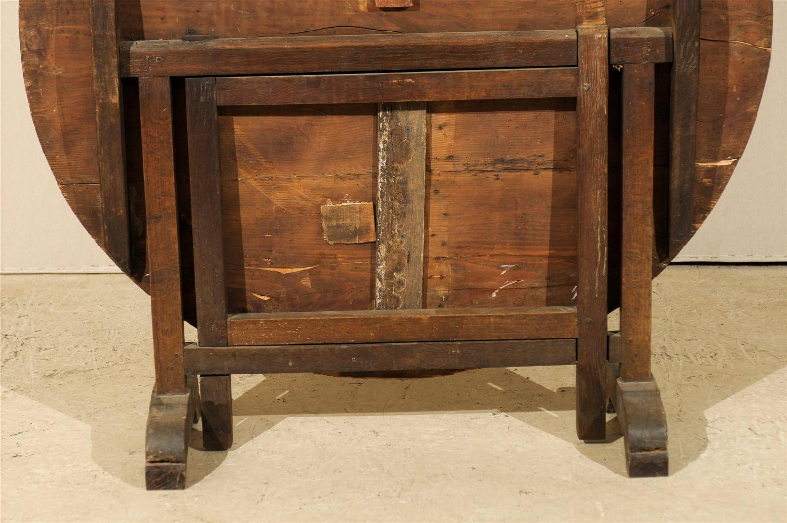 A French Wine Tasting Table of Medium Size with Nice Wood Grain and Round Shape 1