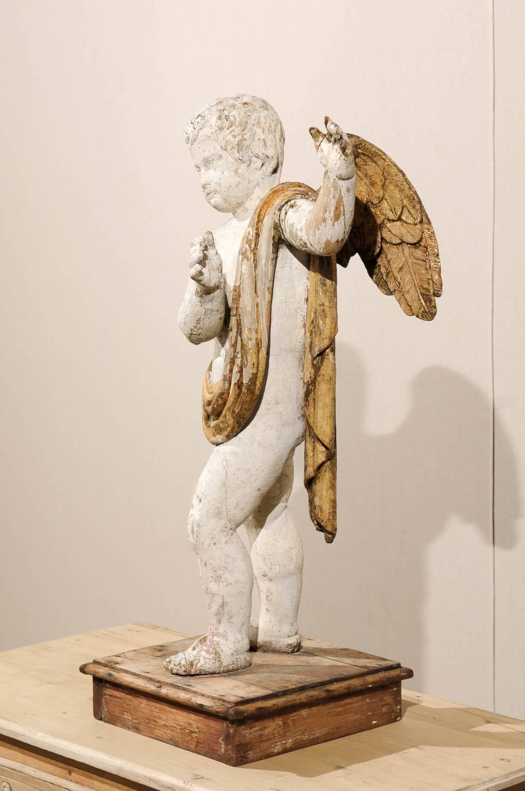 18th Century and Earlier Italian 18th Century Carved Angel with Gilded Wings and Sash Raised on Wood Base