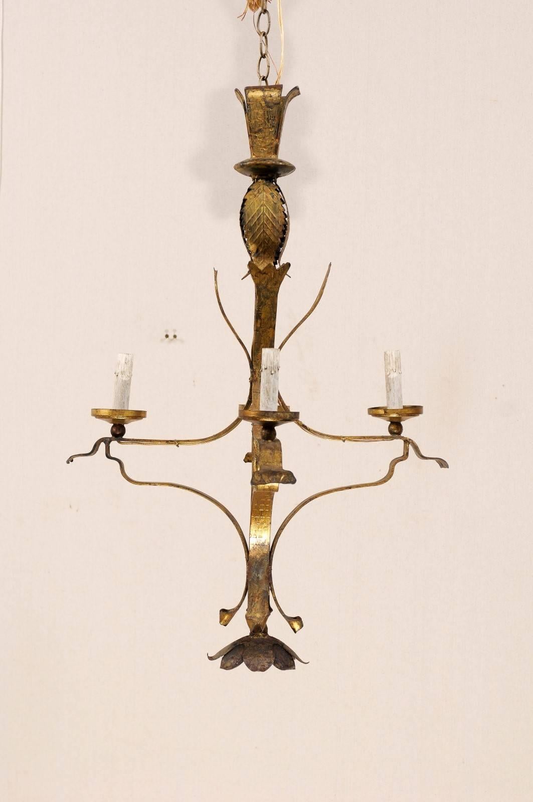 A French Vintage Gilt Iron Four-Light Chandelier with Floral Motif Finial 2