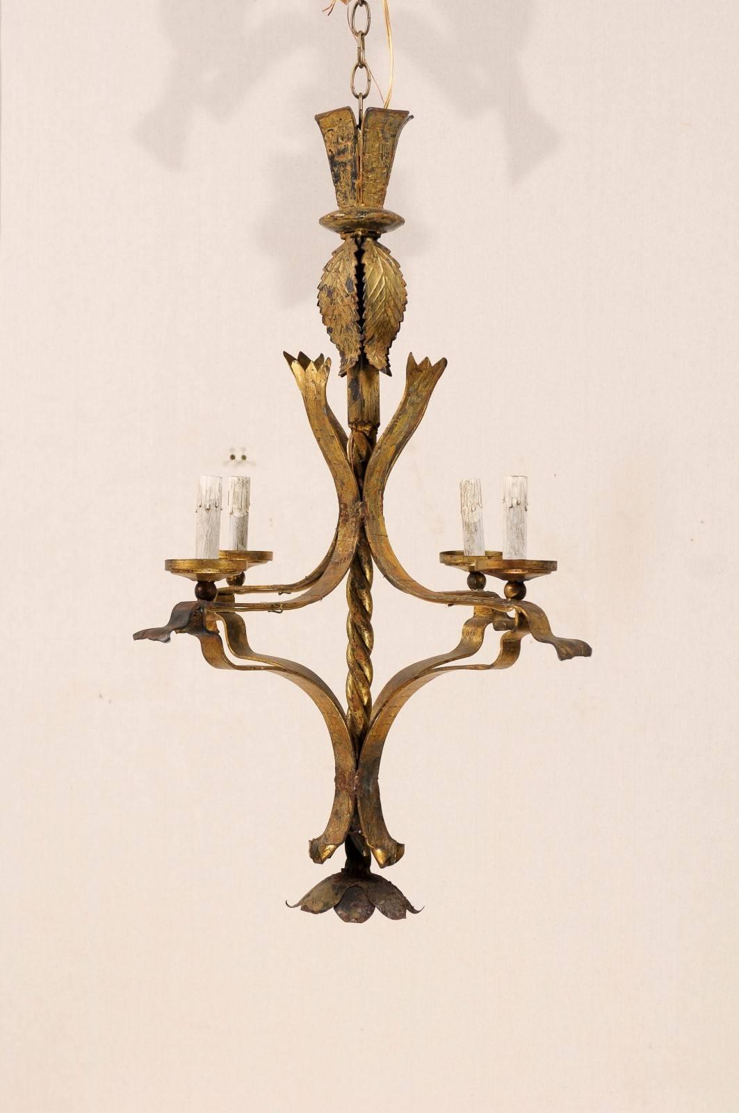 A French Vintage Gilt Iron Four-Light Chandelier with Floral Motif Finial 1