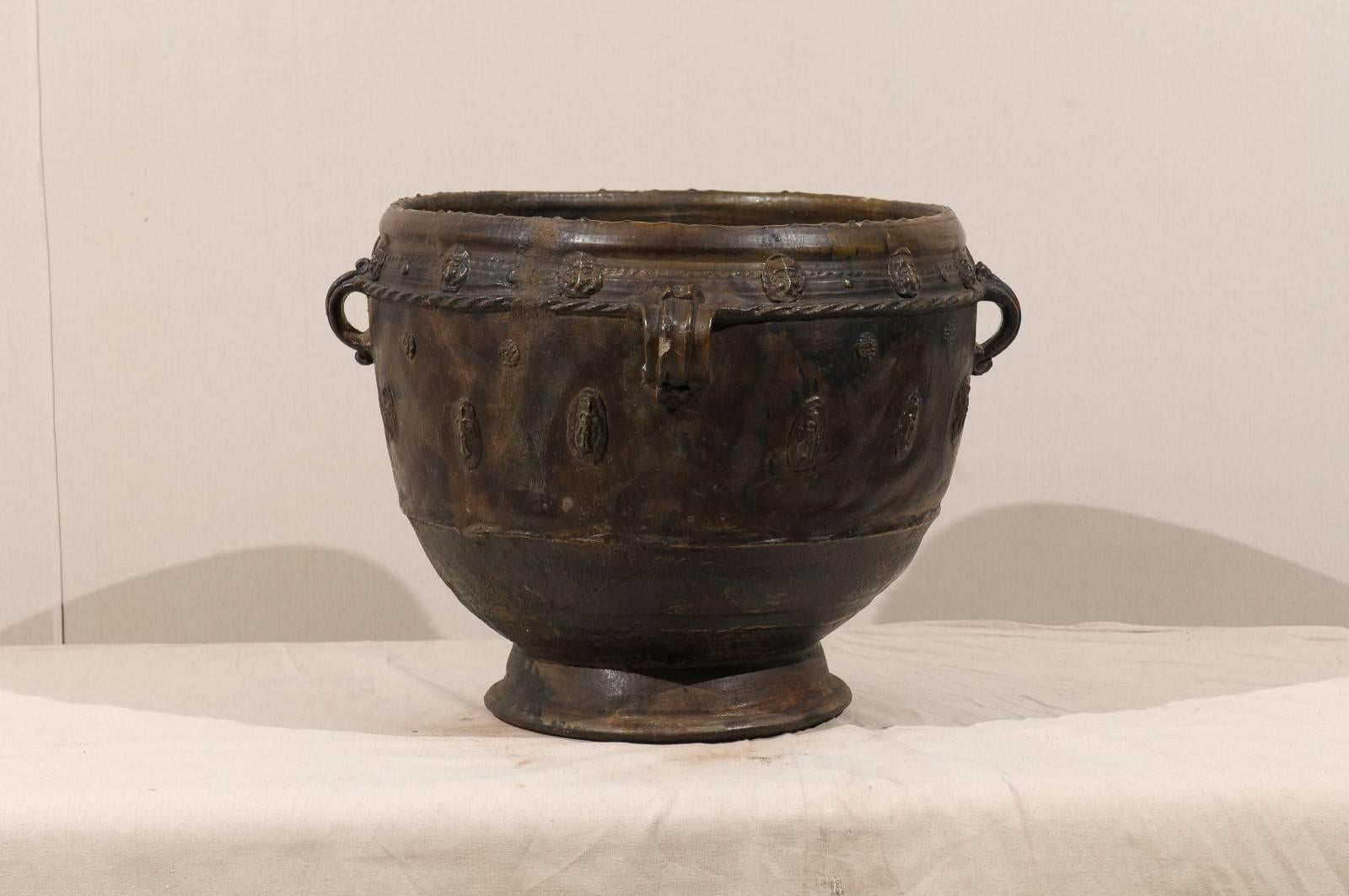 Guatemalan Brown-Black Colored Clay Jar with Four Handles and Decorative Motifs For Sale