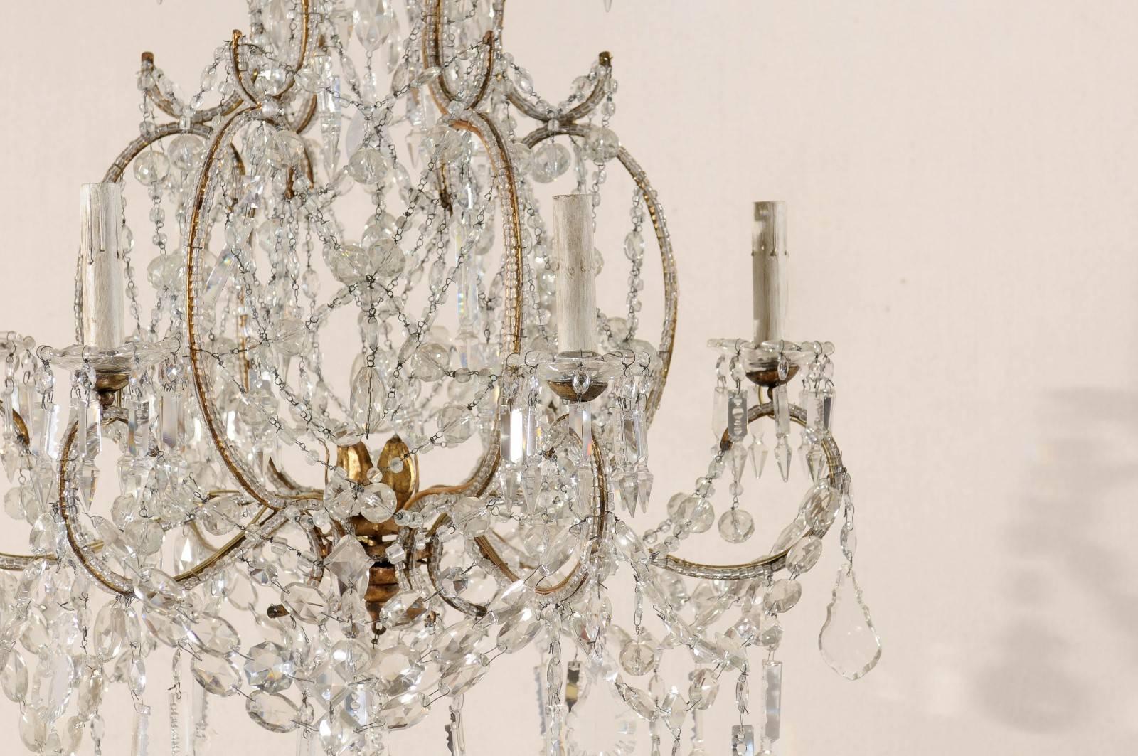 French Crystal and Gilded Iron Chandelier with Scroll Arms and Ornate Beading 1