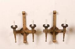 A Pair of Hammered Torch-Style Gilt Iron Sconces from France