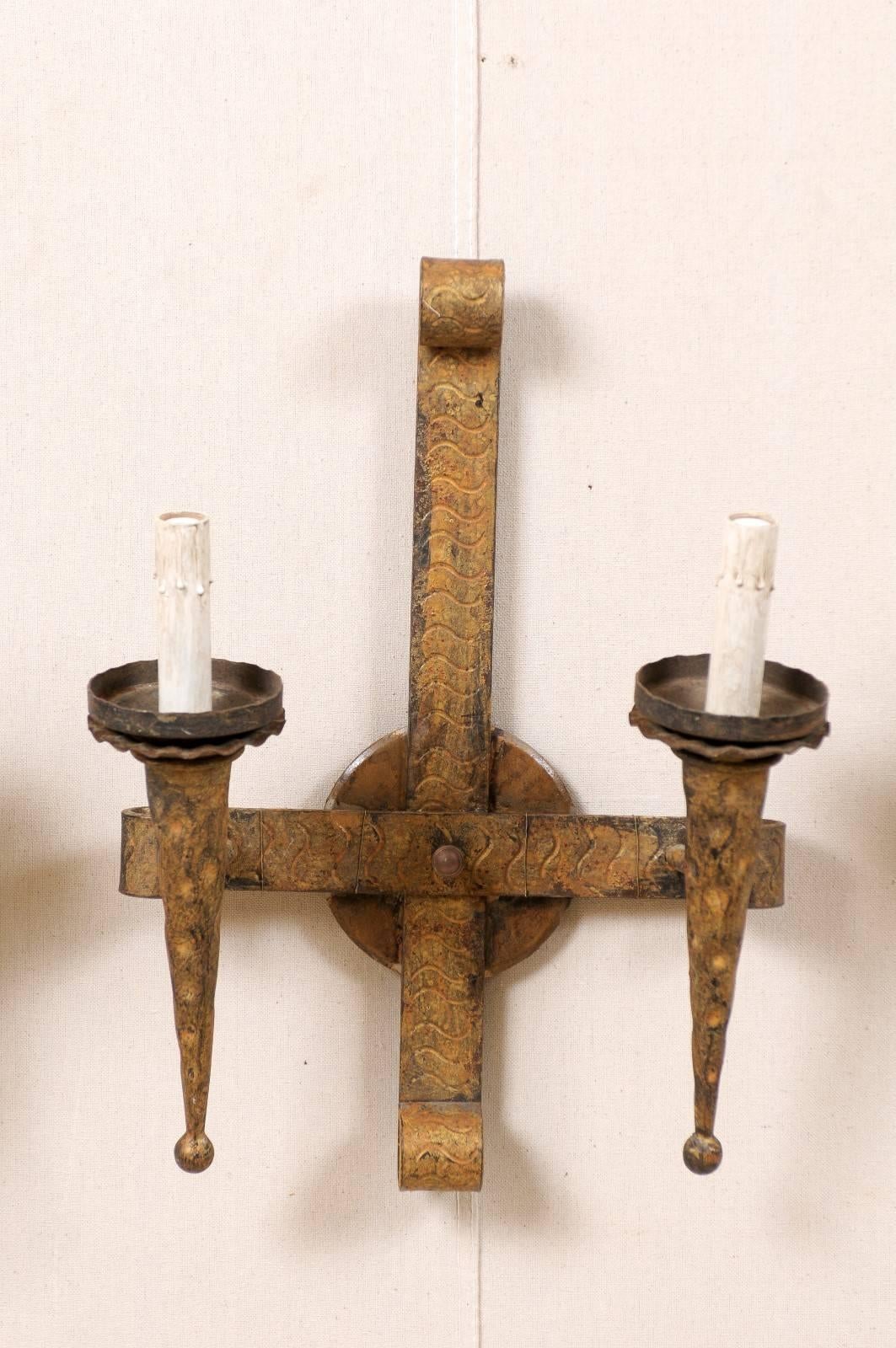 20th Century Pair of French Torch Style Gilt Hammered Iron Sconces with Scroll at Top For Sale