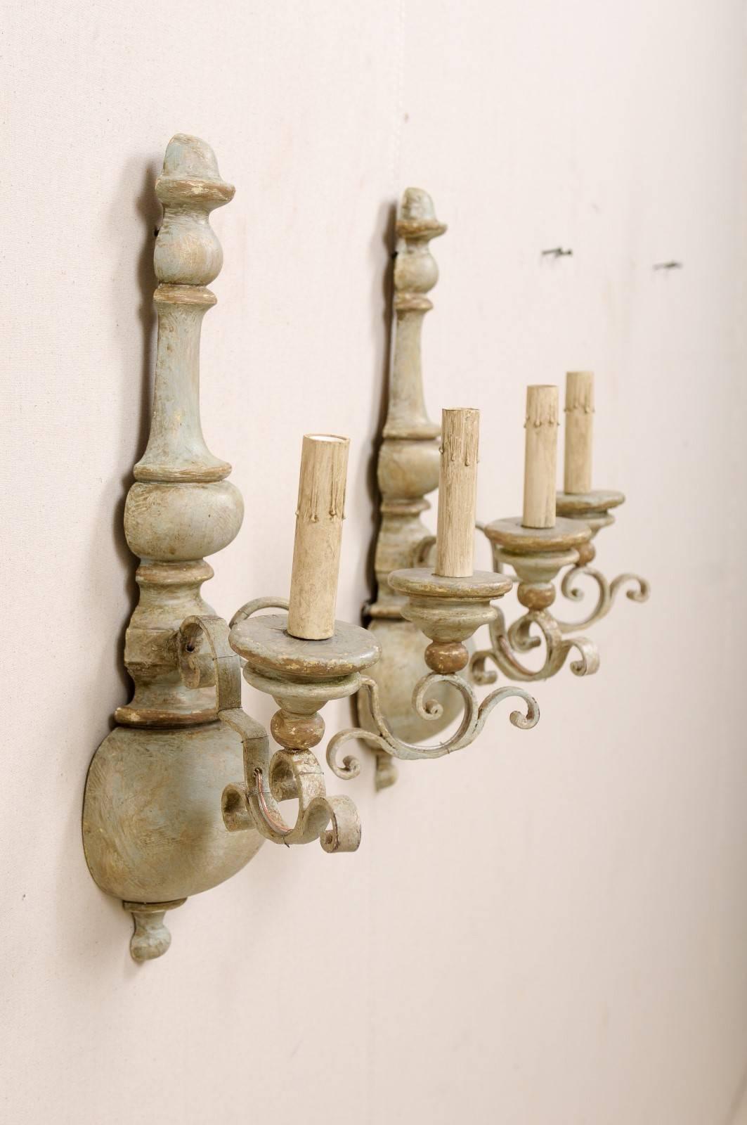 Pair of Painted Metal and Turned Wood Two-Light Sconces with Ornate Scroll Arms In Good Condition In Atlanta, GA