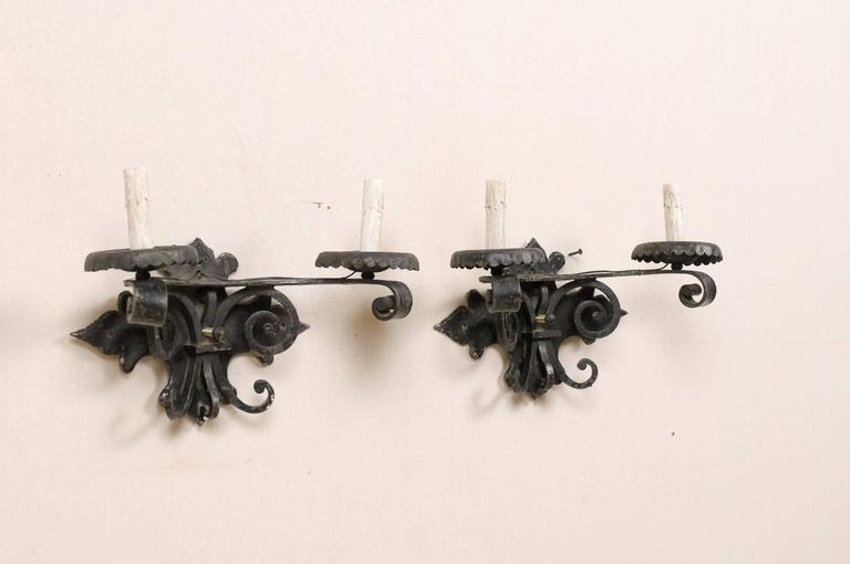 Pair of Spanish Black Iron TwoLight Sconces with Metal Bobèches