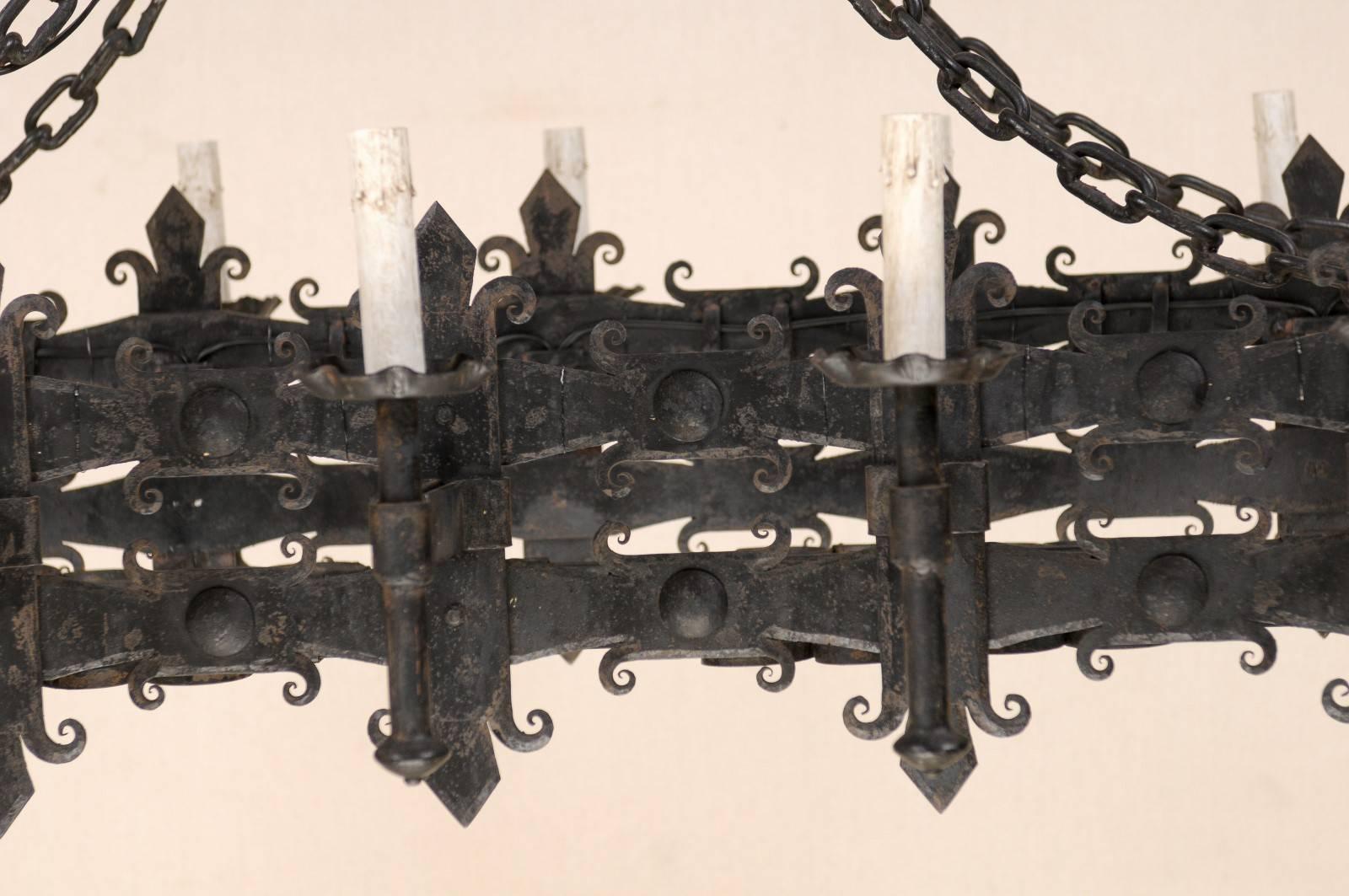 Italian Black Forged Iron Ten-Light Rectangular Chandelier, Fleur de Lys Motif For Sale 2