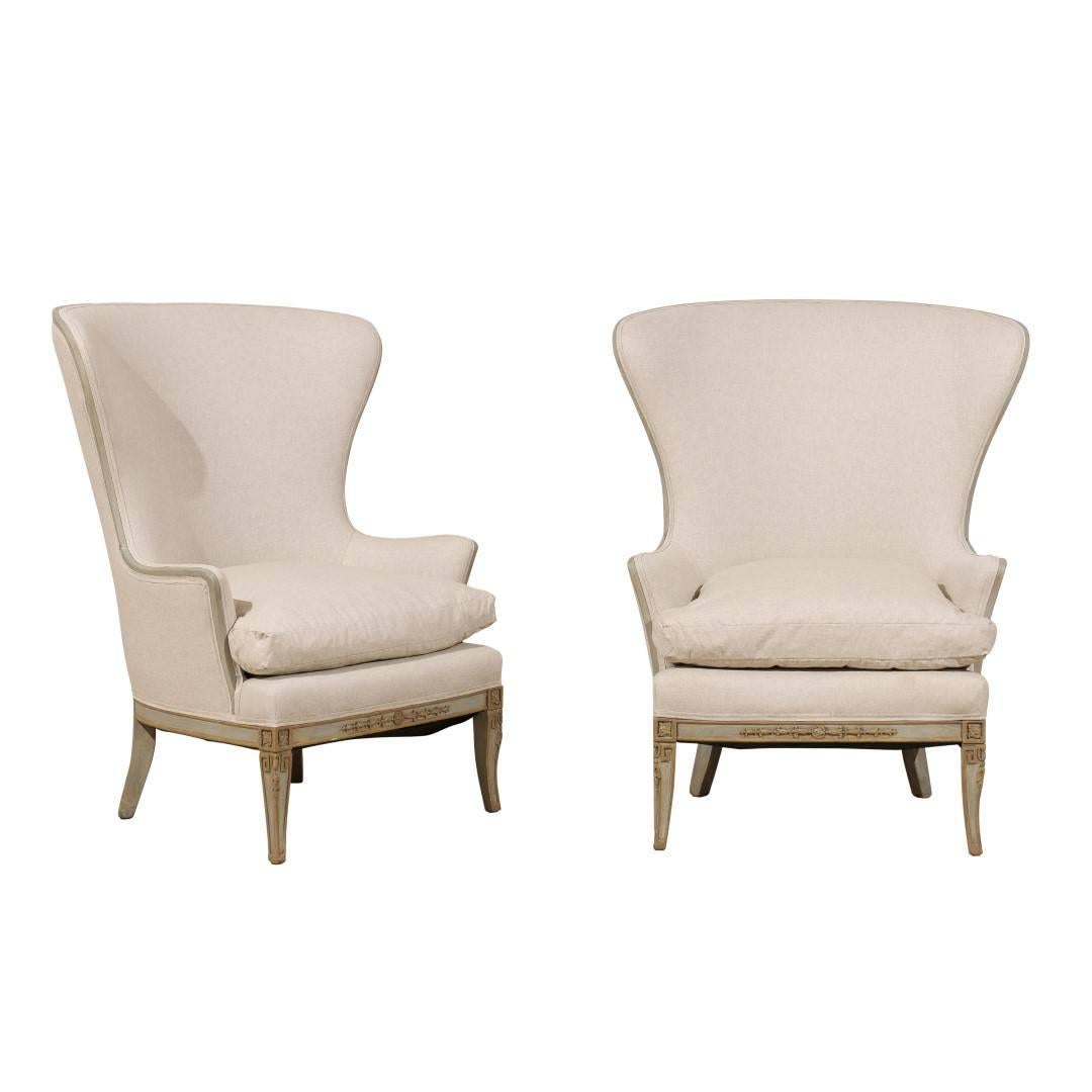 Pair of Painted Wood Wingback Chairs with Carved Details and New Upholstery