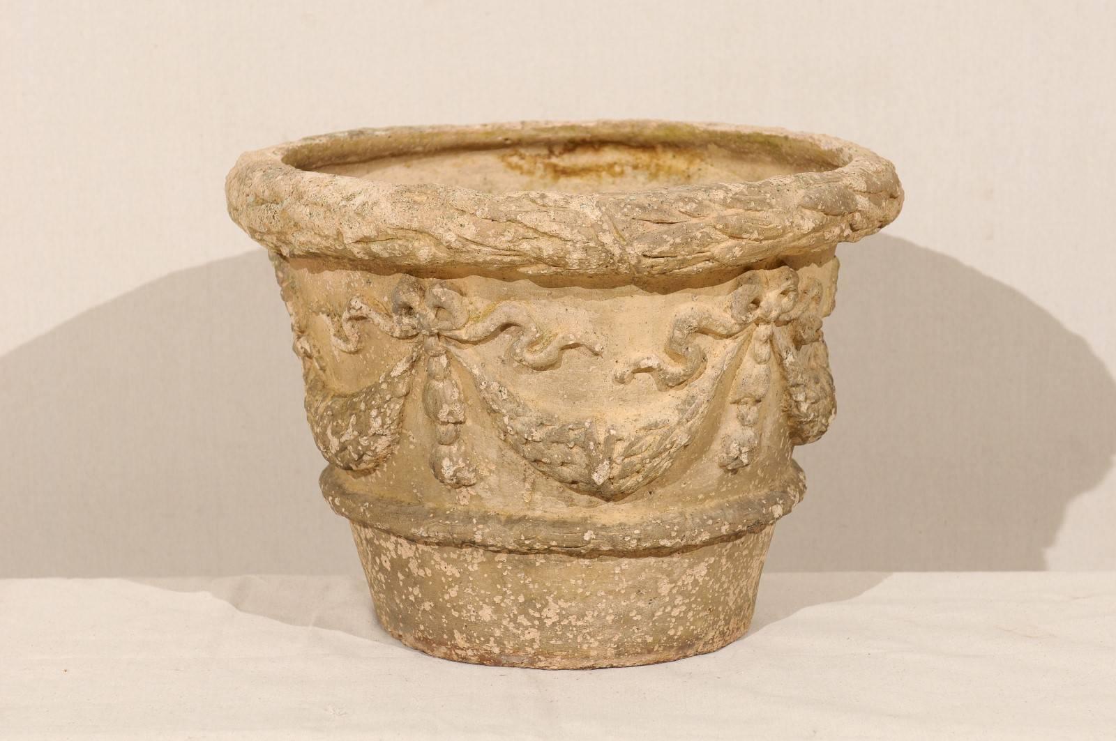 Patinated French Terracotta Aged Garden Pot with Bow and Swag Motif in Beige Cream Color For Sale