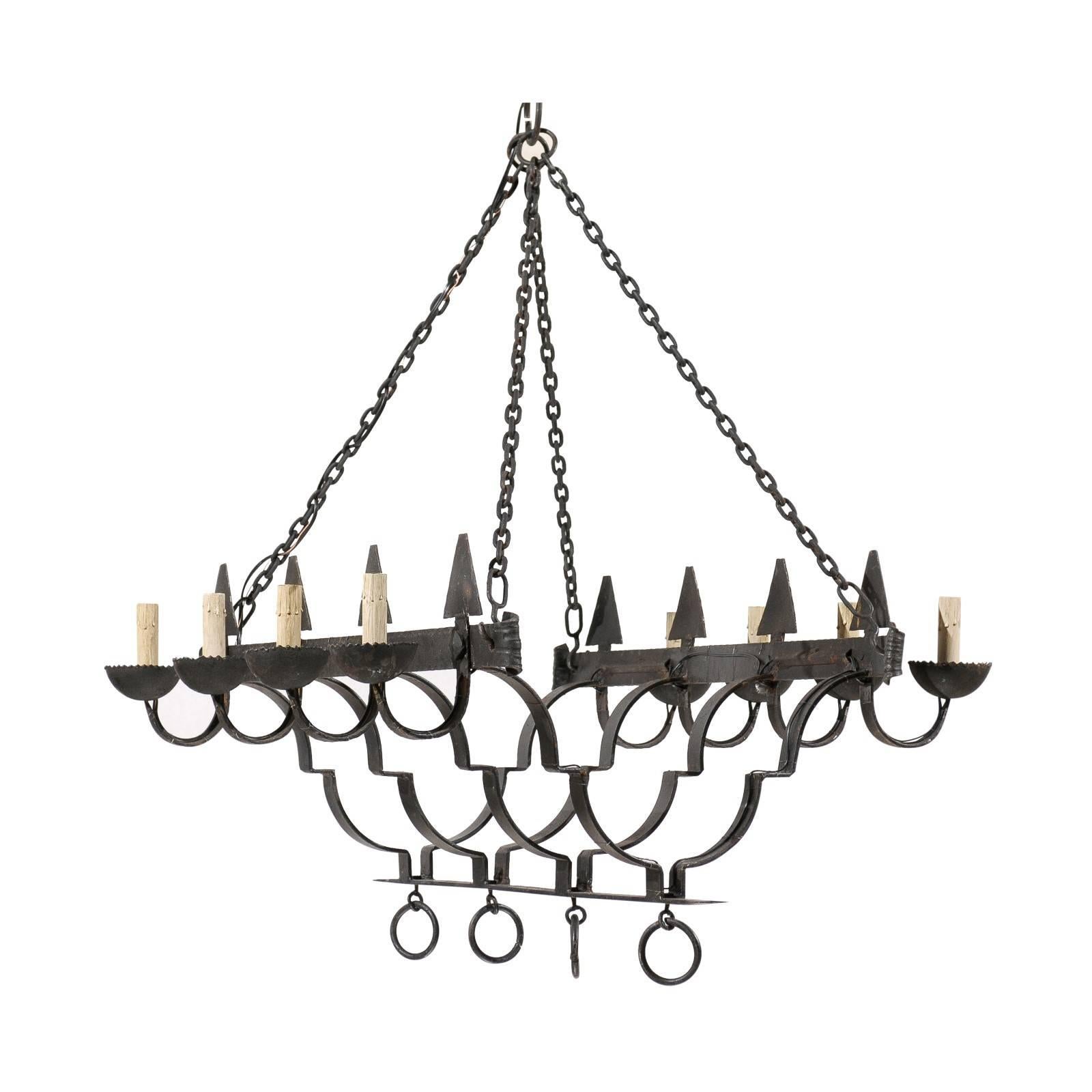 French Linear Eight-Light Black Forged Iron Chandelier, Rewired for US. For Sale