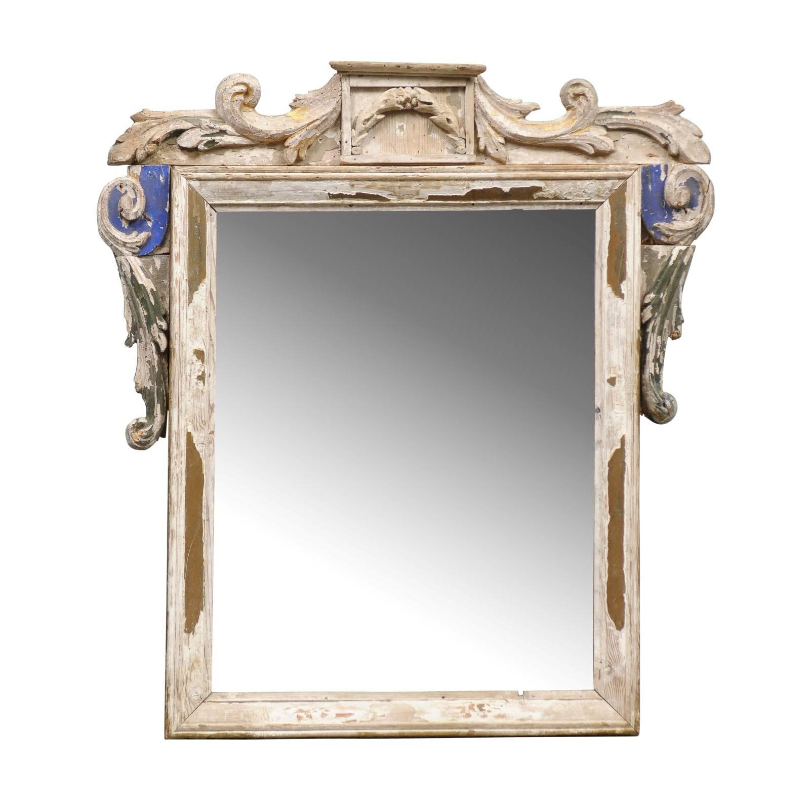 Italian 19th Century Carved Wood Mirror with Volutes Motifs and Blue Accents