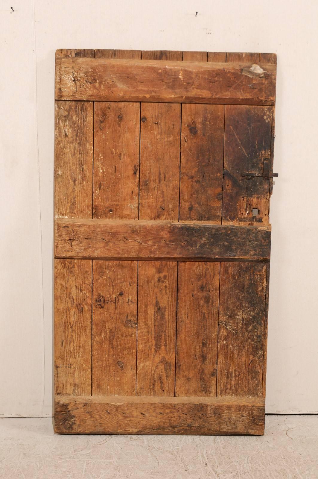 Single 19th Century European Rustic Wood Door with Delicate Carved Pattern 1