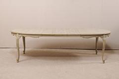 Lovely Painted Wood Neutral Oval Dining Table with Carved and Outlined Skirt