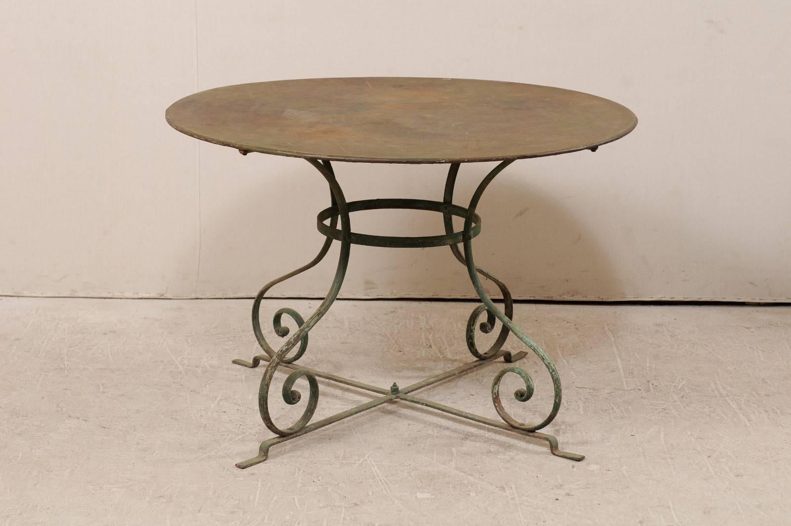 French Mid-20th Century Round Patio Dining Table with Scrolled Legs and Patina In Good Condition In Atlanta, GA
