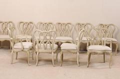 Set of Ten Venetian Style Painted Wood Chairs with Intertwined Pretzel Backs